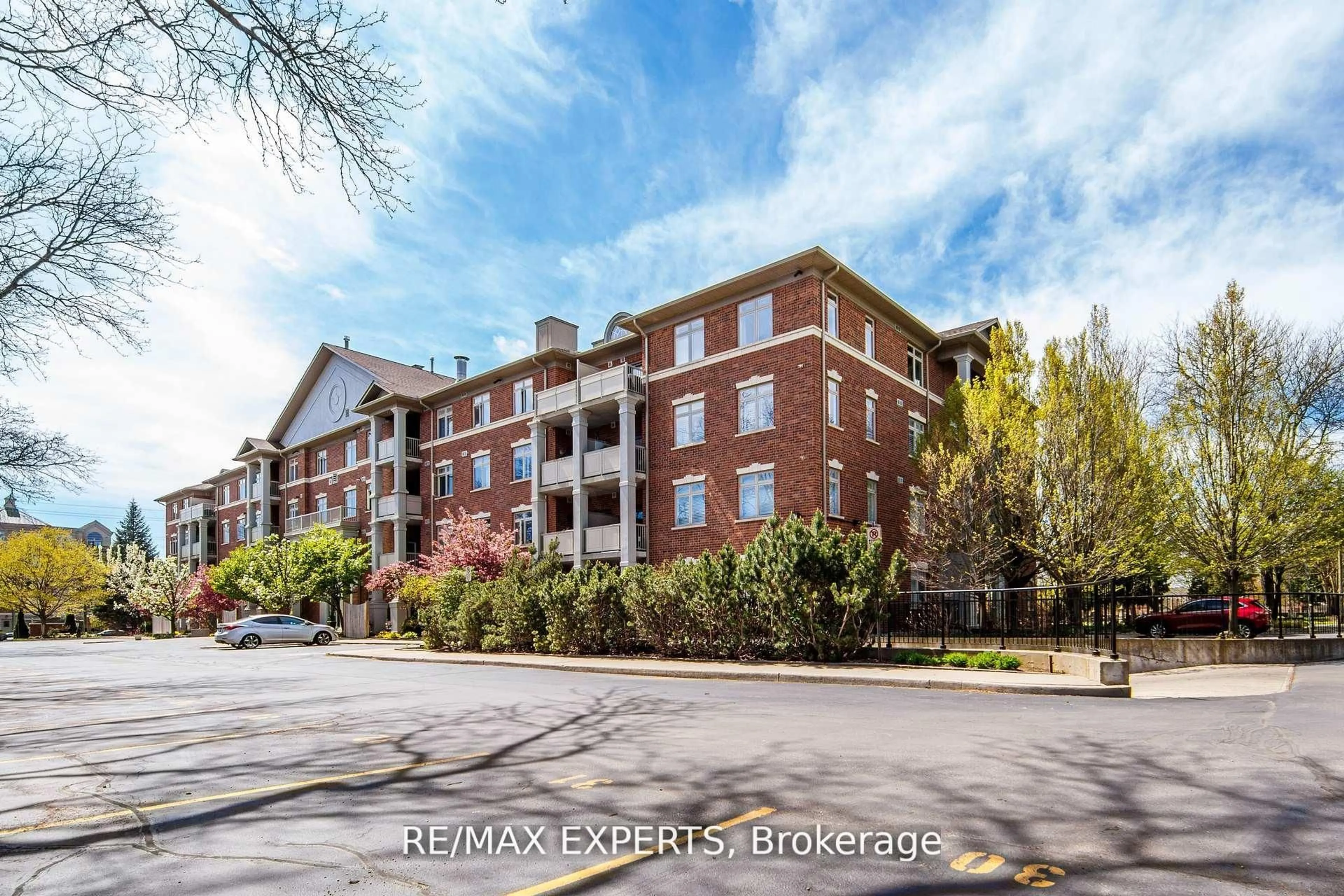 A pic from outside/outdoor area/front of a property/back of a property/a pic from drone, unknown for 391 Plains Rd #102, Burlington Ontario L7T 4M2