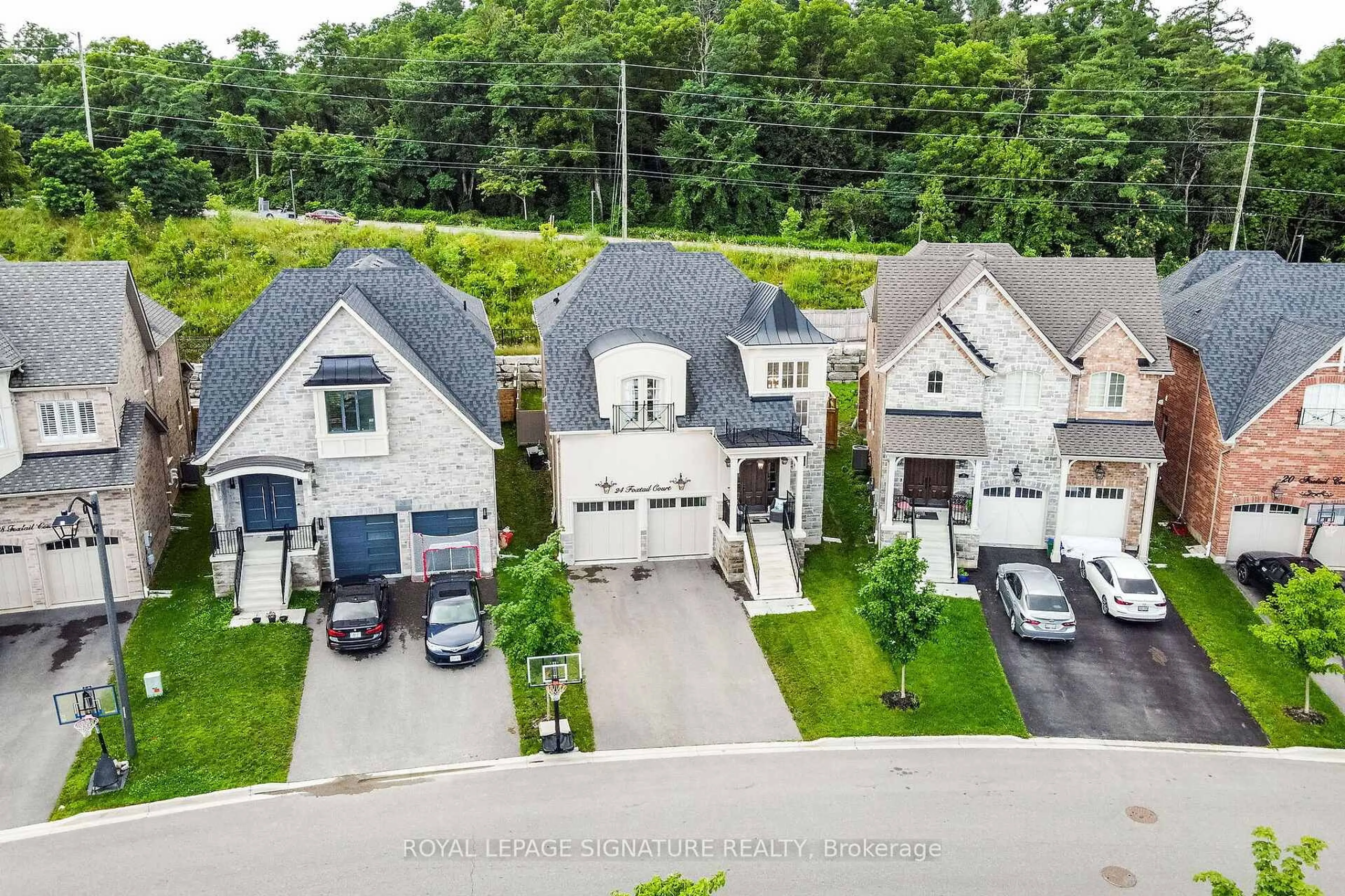 A pic from outside/outdoor area/front of a property/back of a property/a pic from drone, street for 24 Foxtail Crt, Halton Hills Ontario L7G 6N7