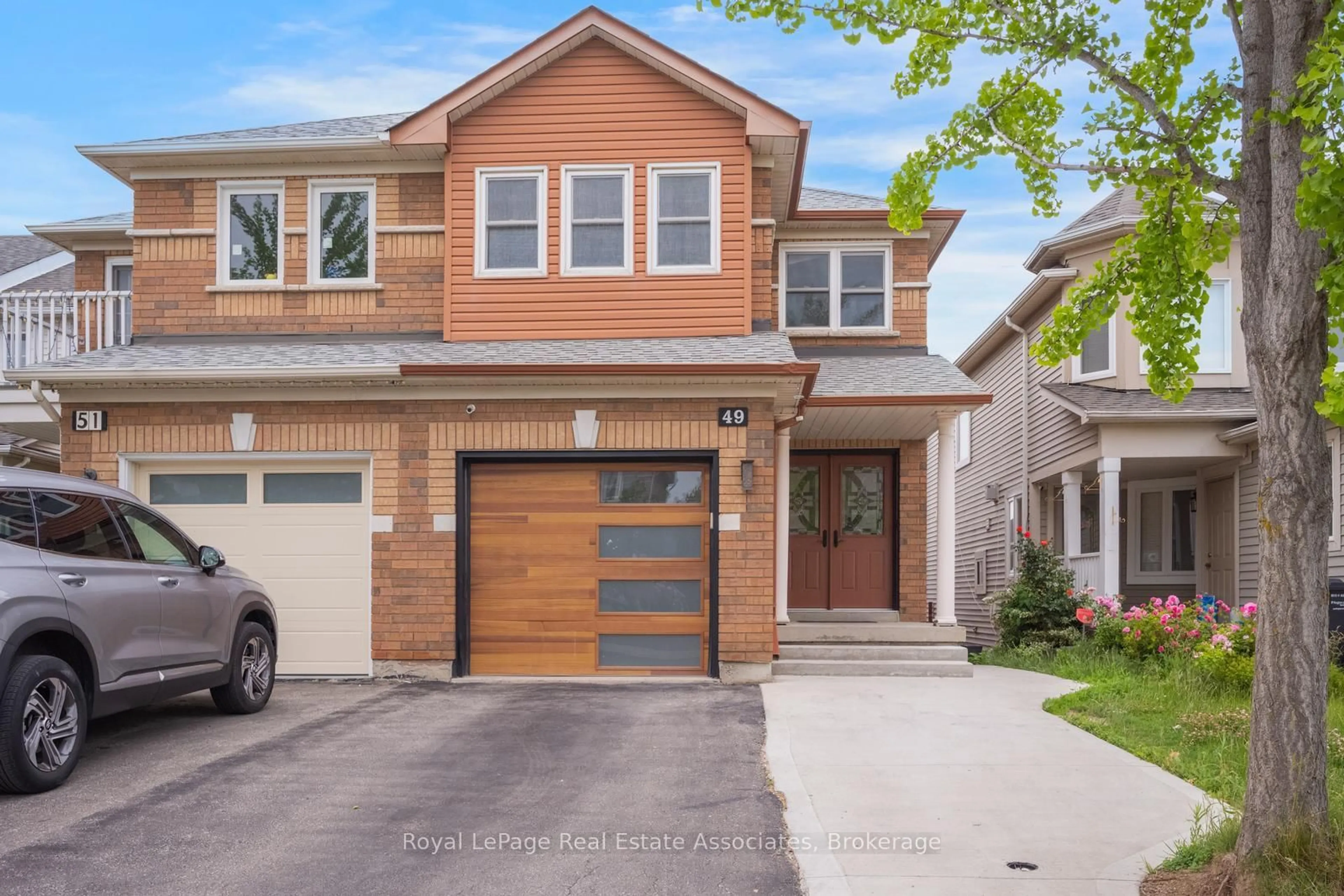 Home with brick exterior material, street for 49 Tiller Tr, Brampton Ontario L6X 4R6