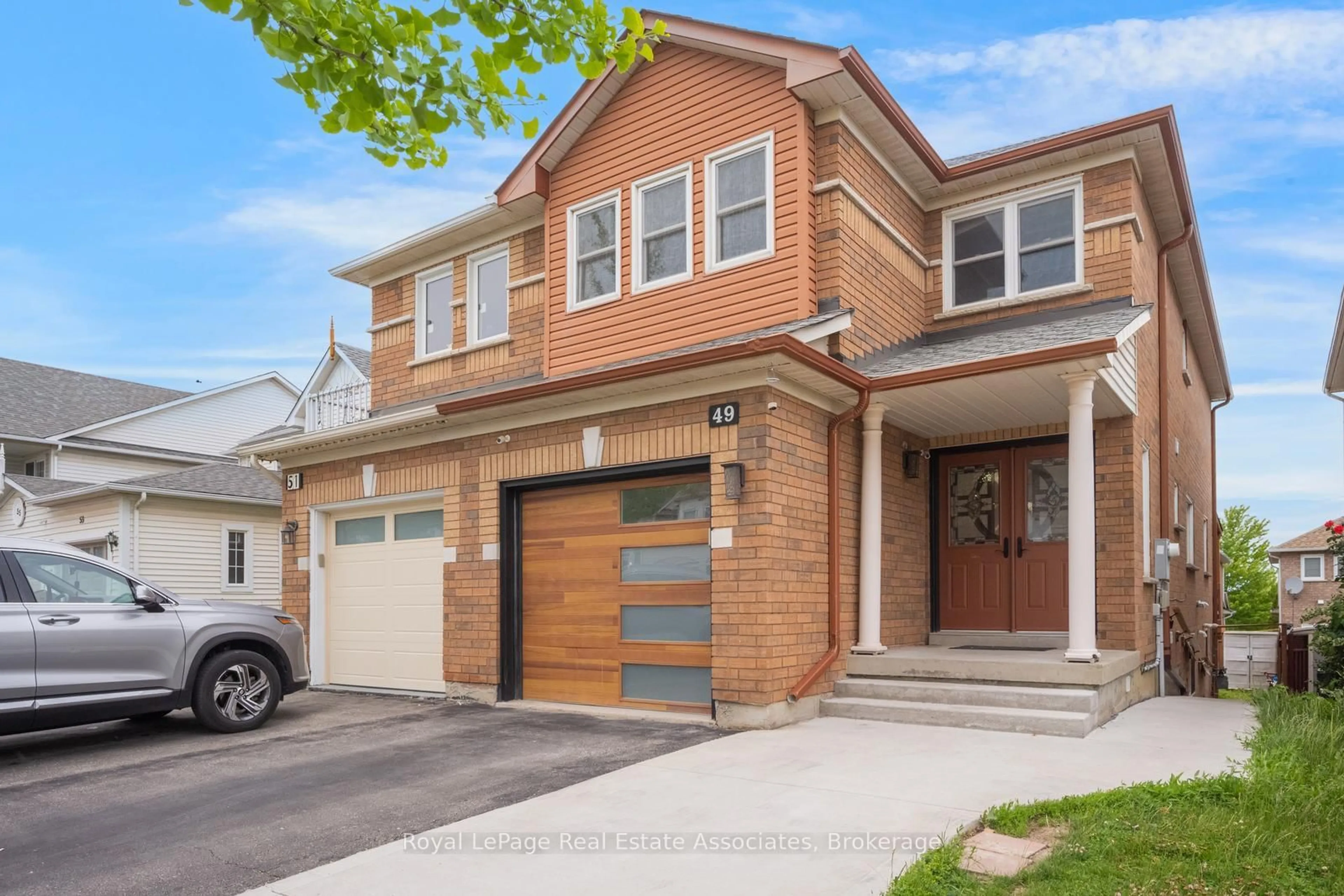 Home with brick exterior material, street for 49 Tiller Tr, Brampton Ontario L6X 4R6