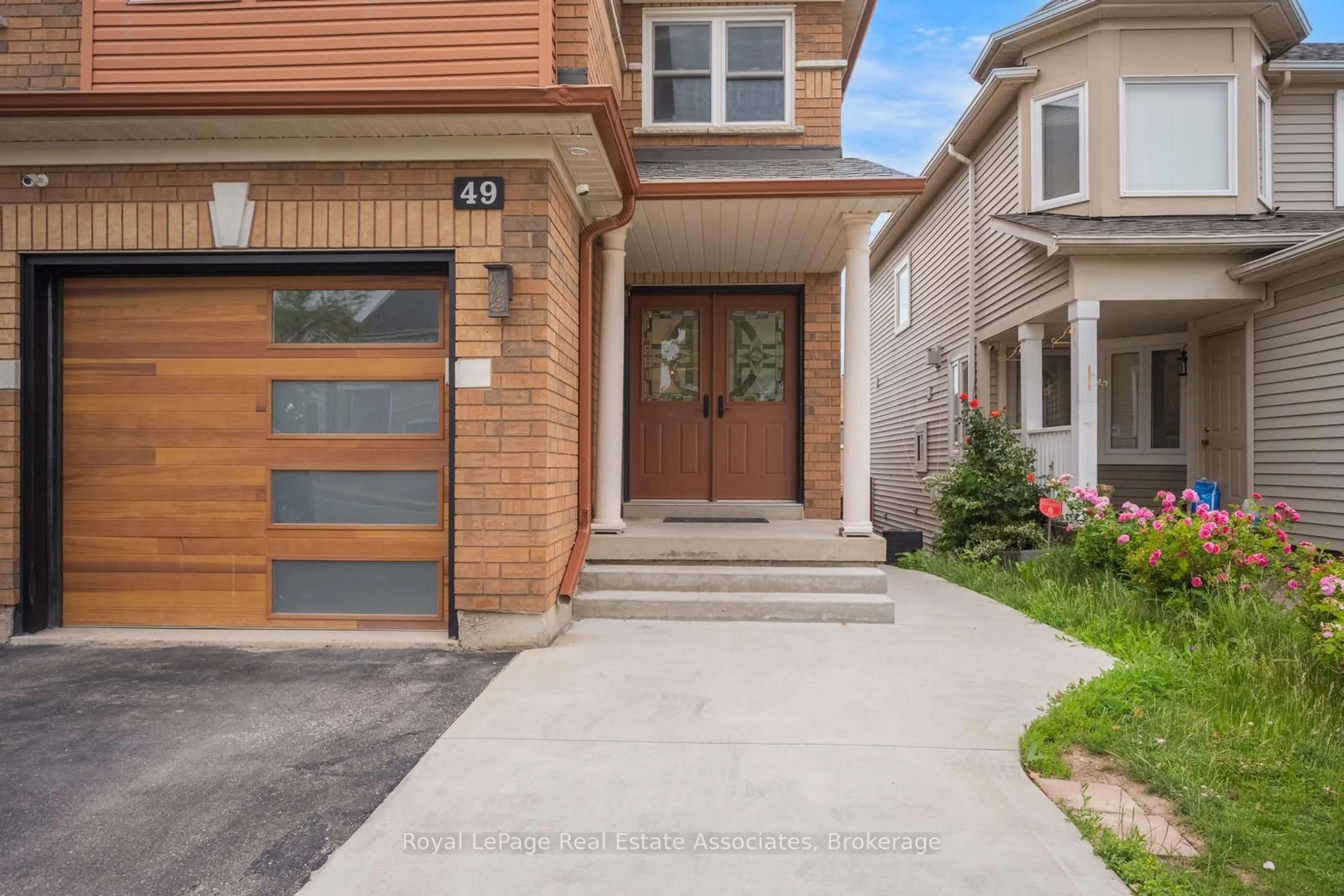 Home with brick exterior material, street for 49 Tiller Tr, Brampton Ontario L6X 4R6