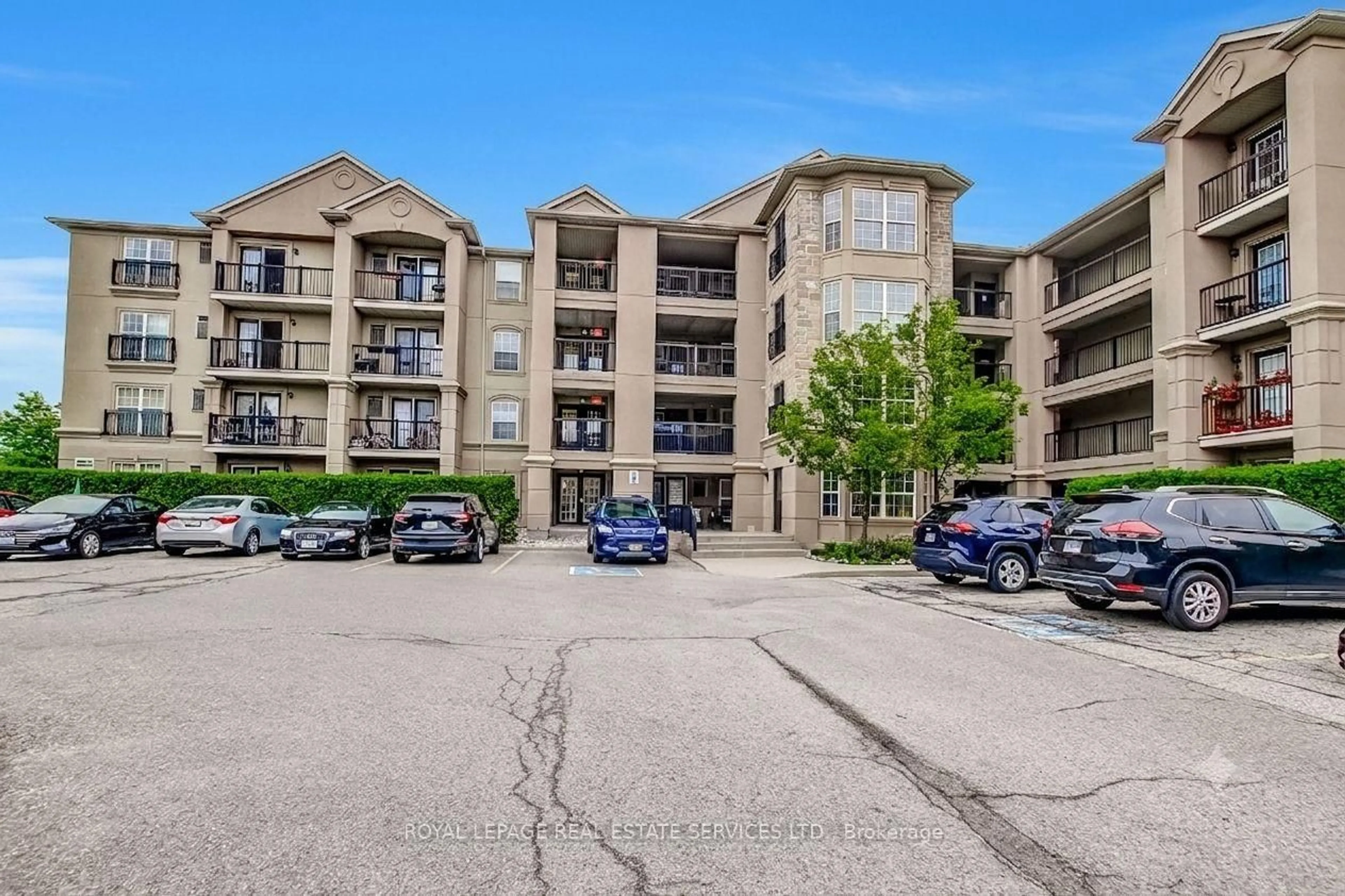 A pic from outside/outdoor area/front of a property/back of a property/a pic from drone, unknown for 1483 Maple Ave #409, Milton Ontario L9T 0B6