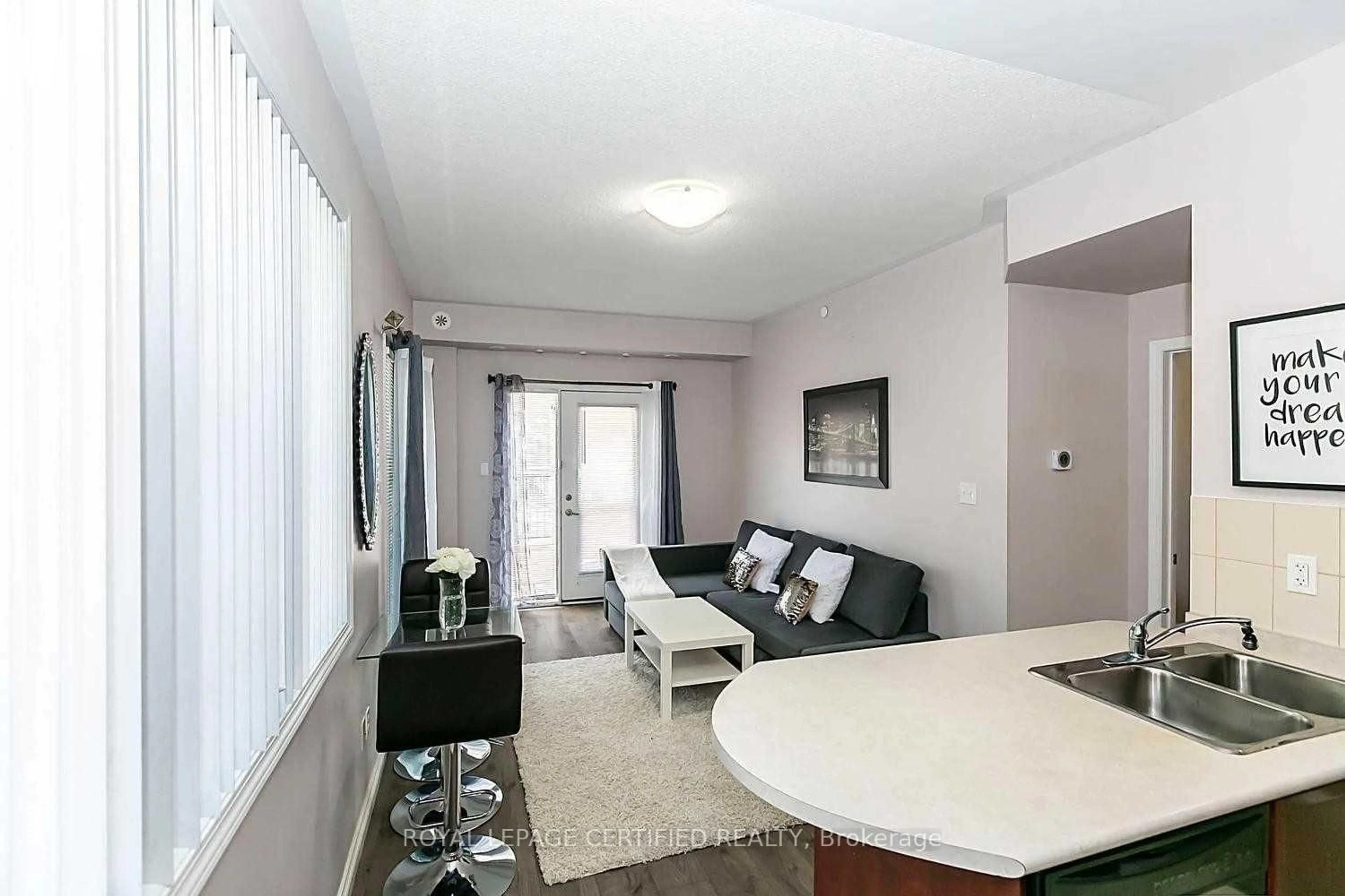 Living room with furniture, unknown for 3075 Thomas St #103, Mississauga Ontario L5M 0L8
