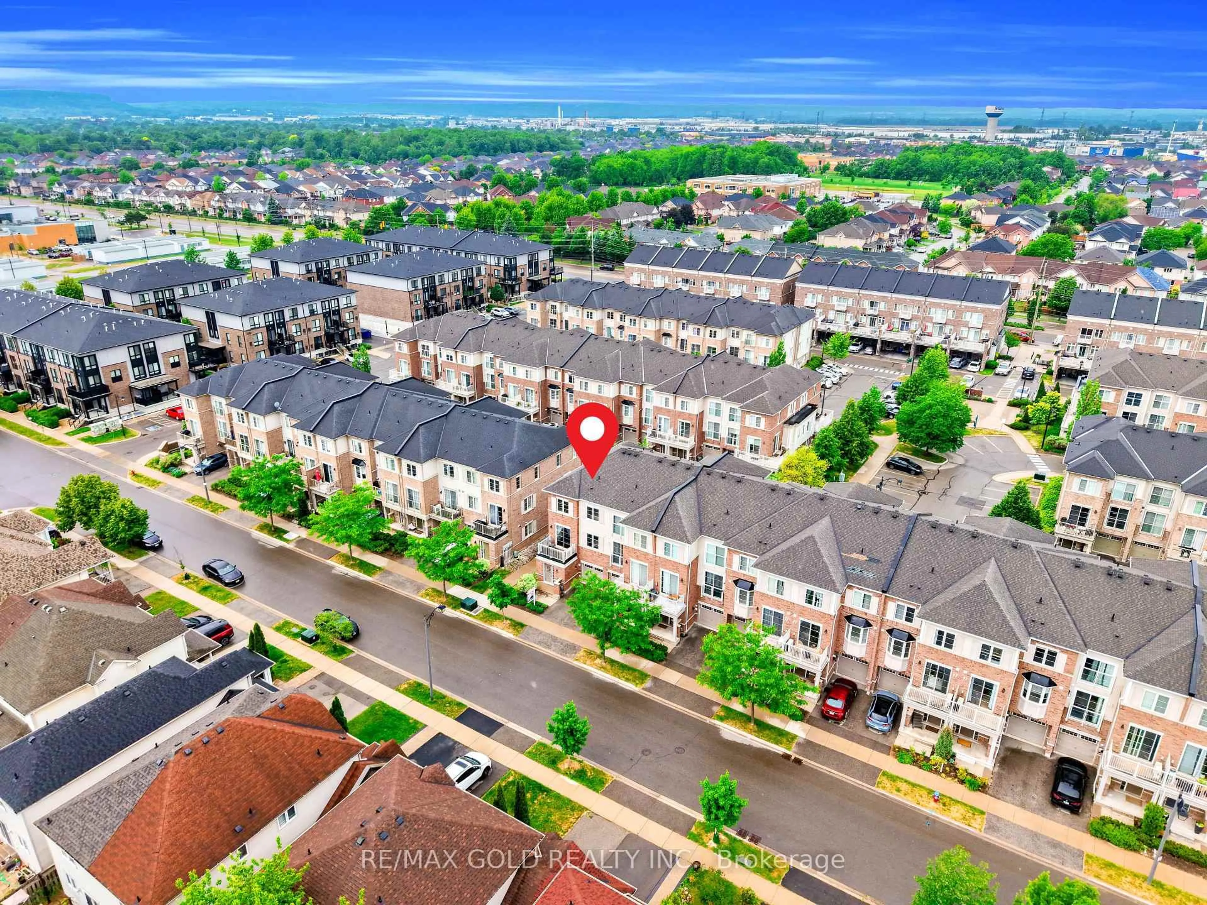A pic from outside/outdoor area/front of a property/back of a property/a pic from drone, city buildings view from balcony for 165 HAMPSHIRE Way #128, Milton Ontario L9T 8M7
