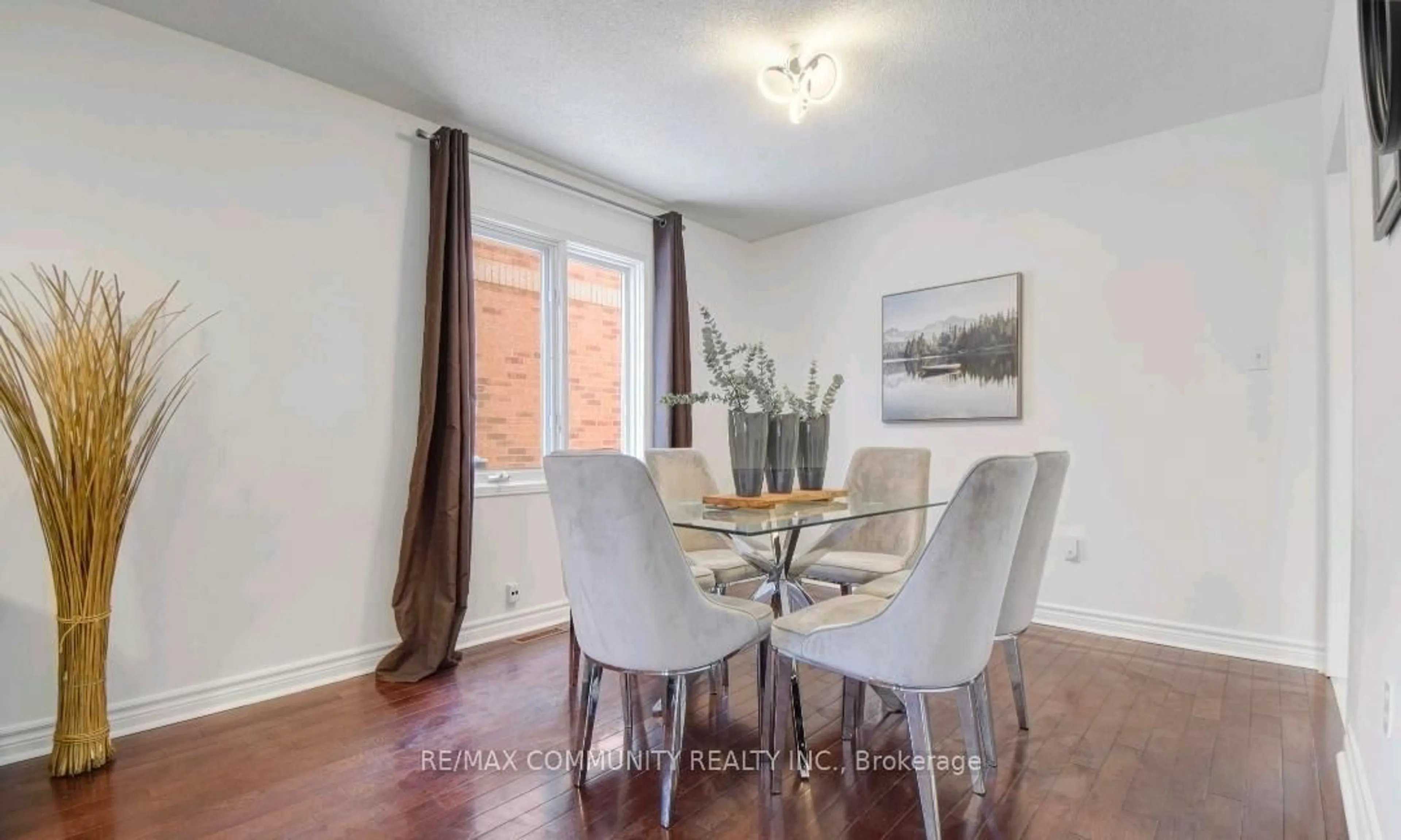Dining room, wood/laminate floor for 96 Mosley Cres, Brampton Ontario L6Y 5C9