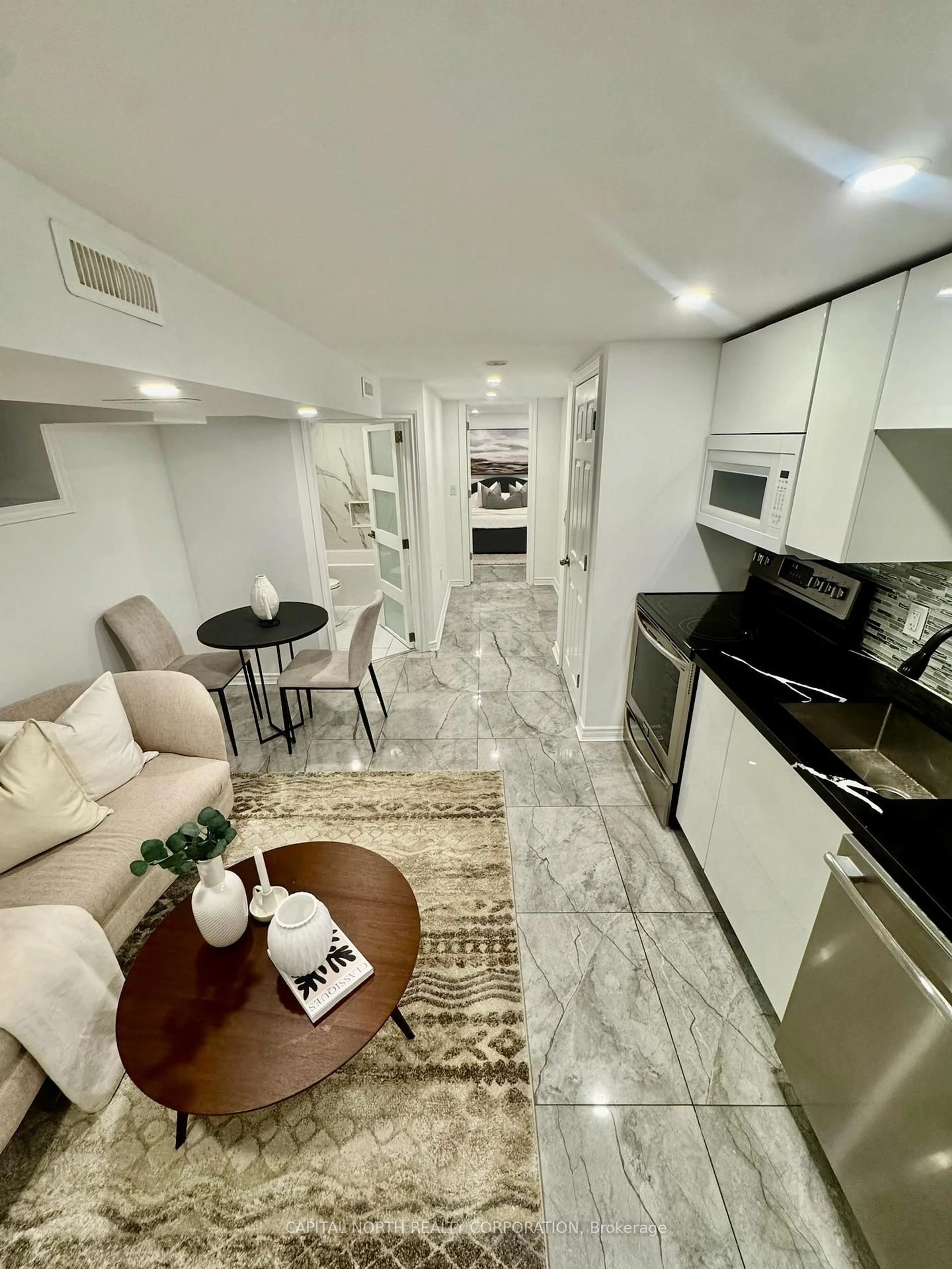 Open concept kitchen, ceramic/tile floor for 219 McRoberts Ave, Toronto Ontario M6E 4P3
