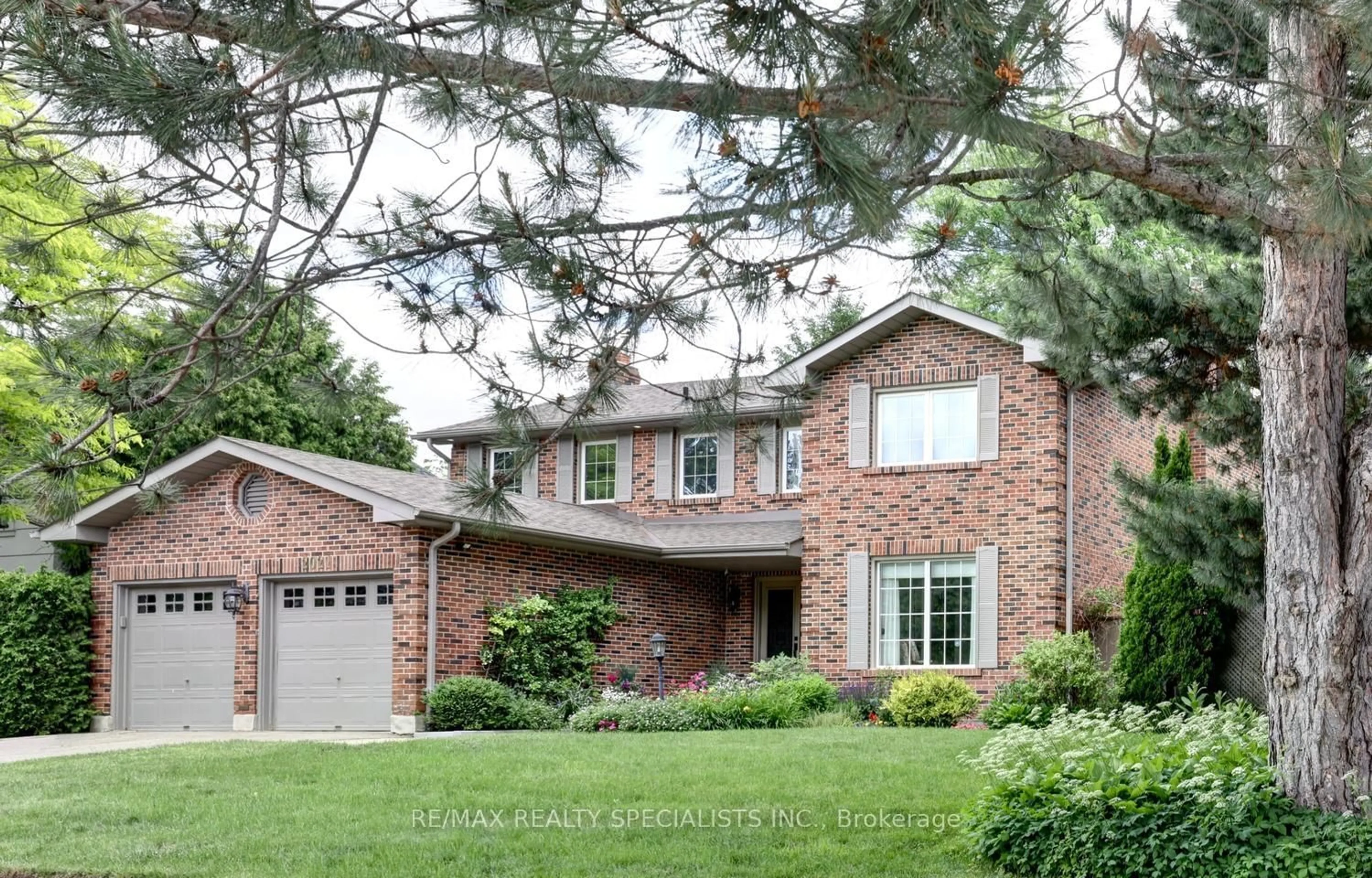 Home with brick exterior material, street for 2021 Shawanaga Tr, Mississauga Ontario L5H 3Z3