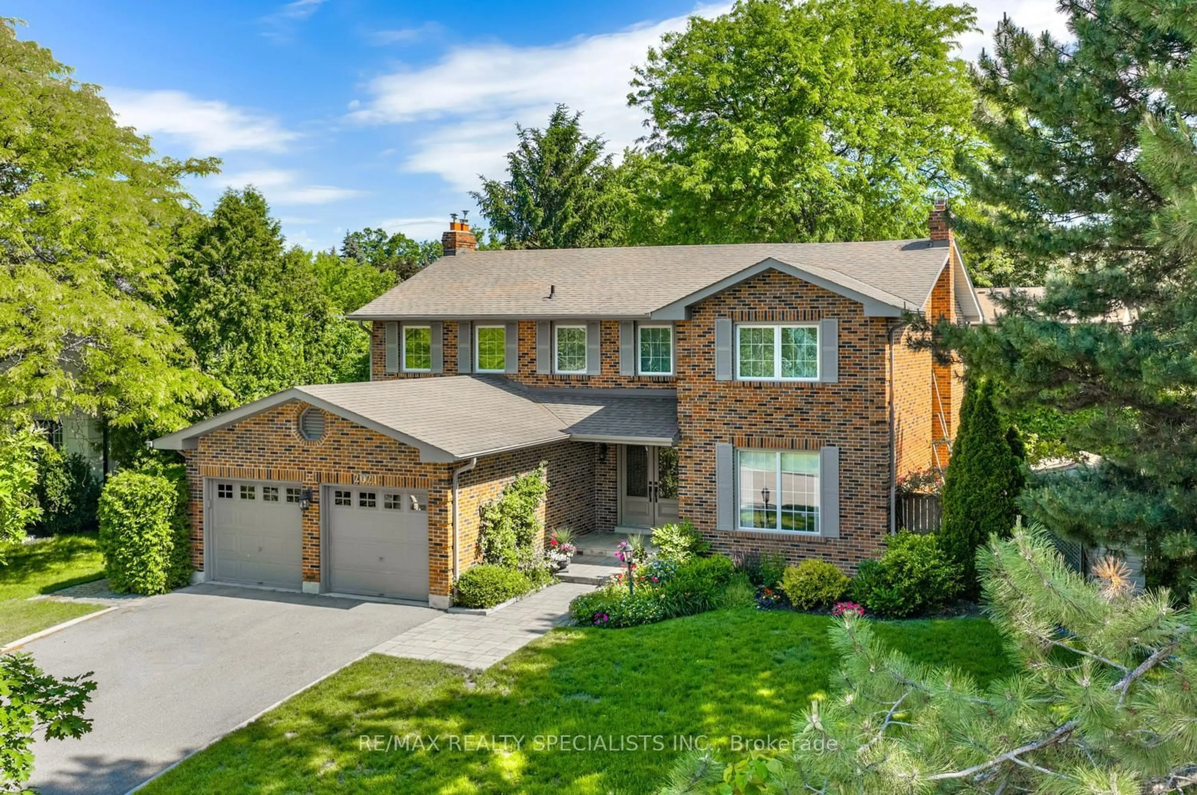 Home with brick exterior material, street for 2021 Shawanaga Tr, Mississauga Ontario L5H 3Z3