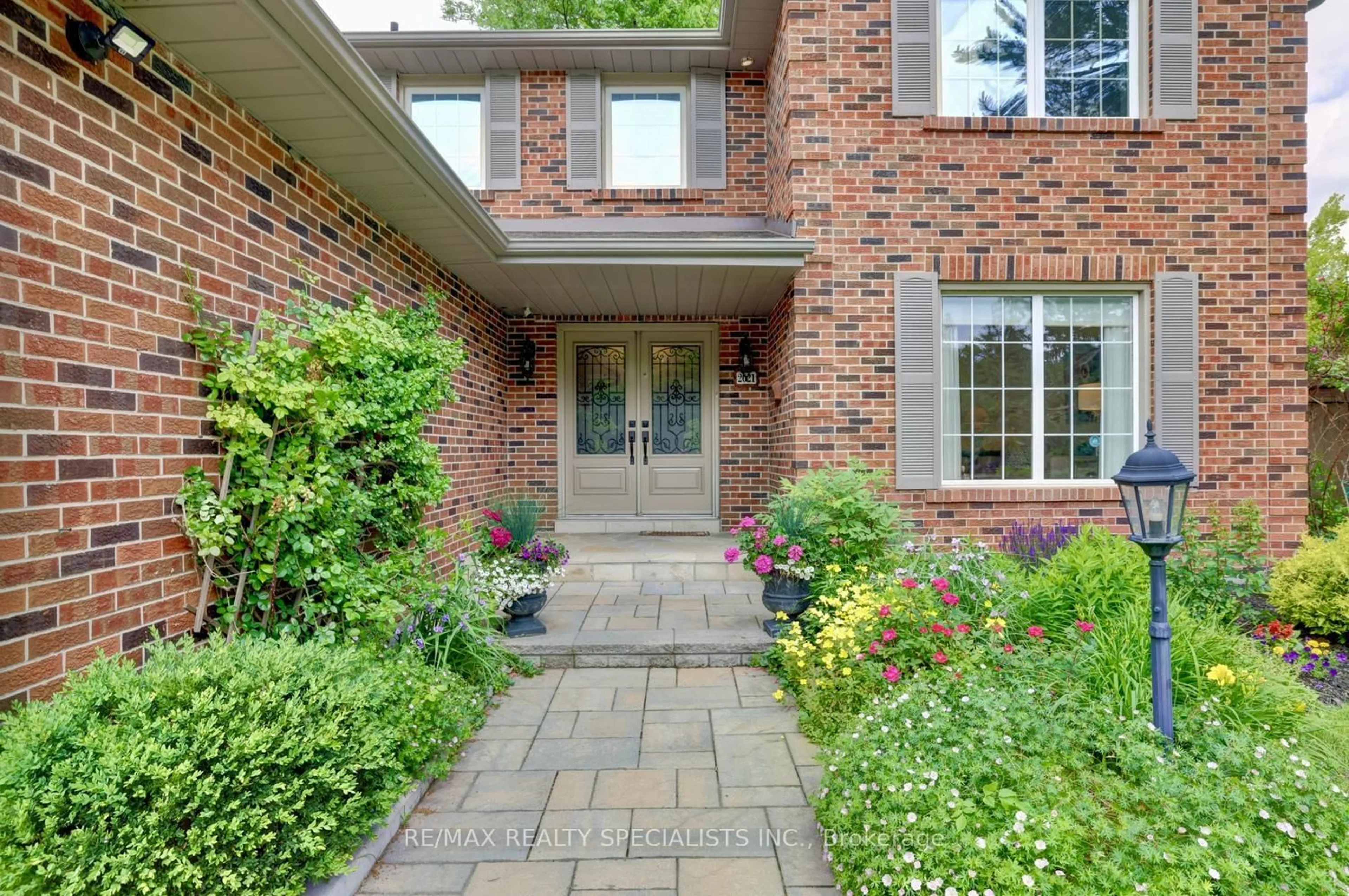 Home with brick exterior material, street for 2021 Shawanaga Tr, Mississauga Ontario L5H 3Z3