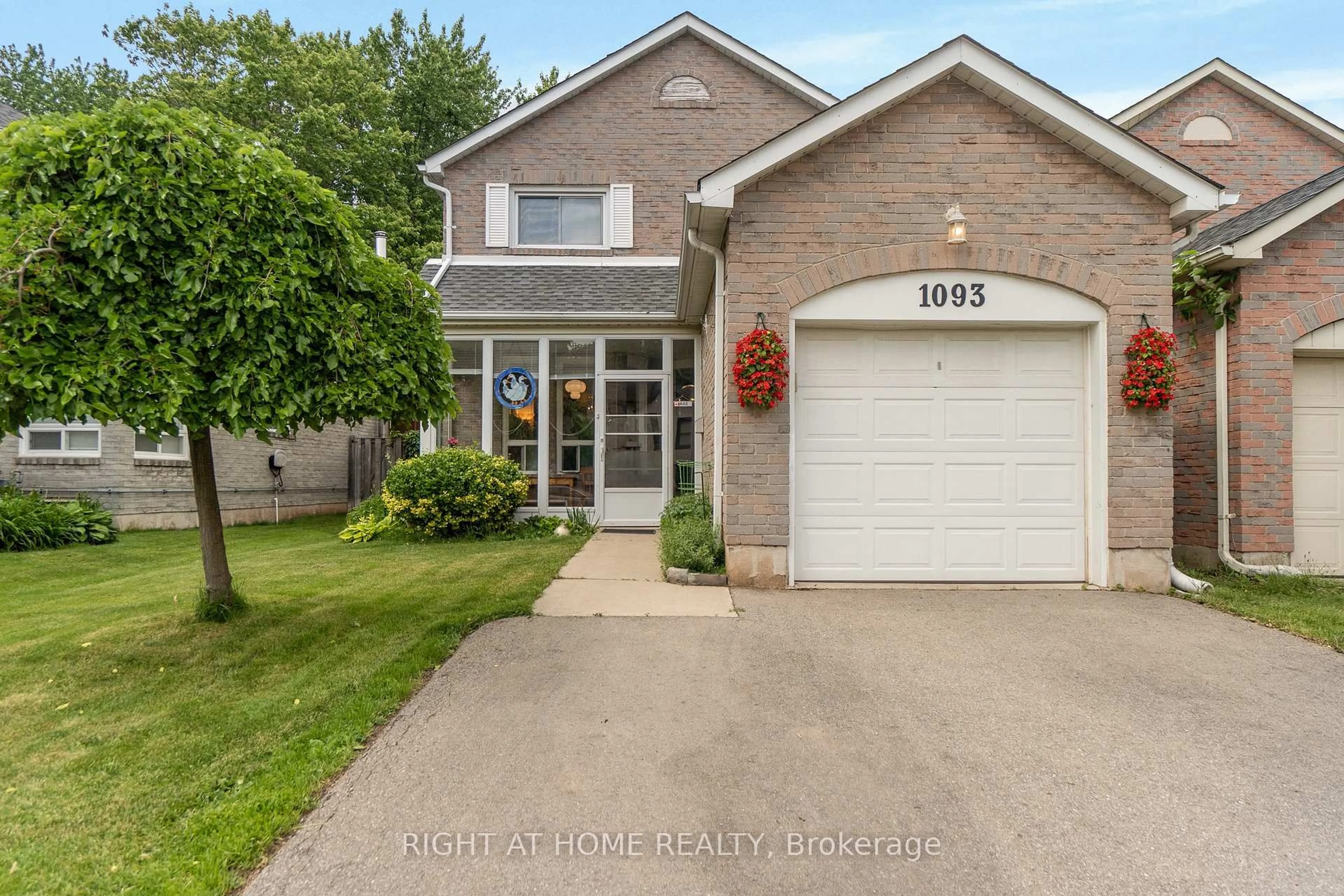 Home with brick exterior material, street for 1093 Montgomery Dr, Oakville Ontario L6M 1E8