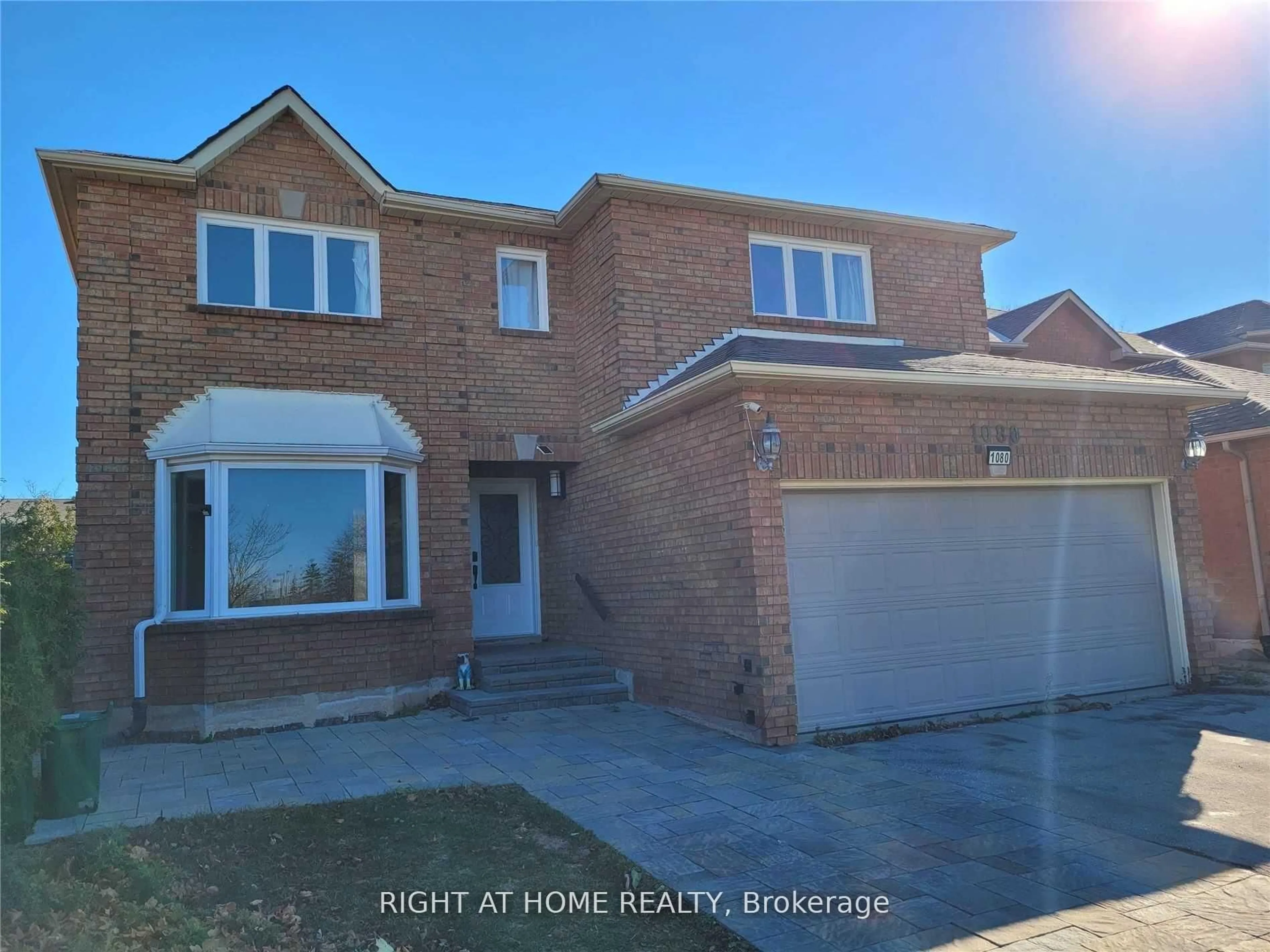 Home with brick exterior material, street for 1080 Glenashton Dr, Oakville Ontario L6H 4B9
