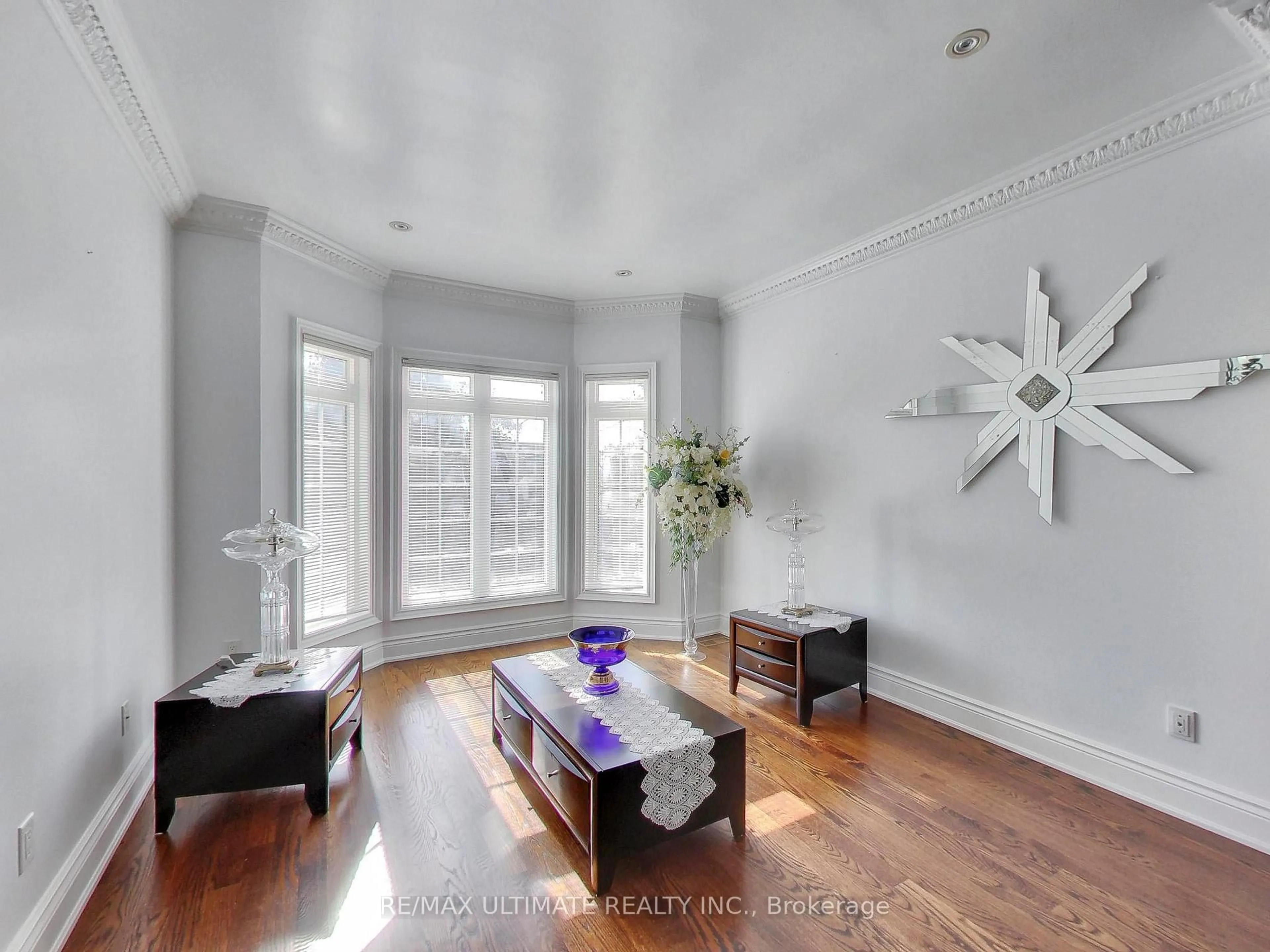 Living room with furniture, wood/laminate floor for 26 Dynevor Rd, Toronto Ontario M6E 3X1