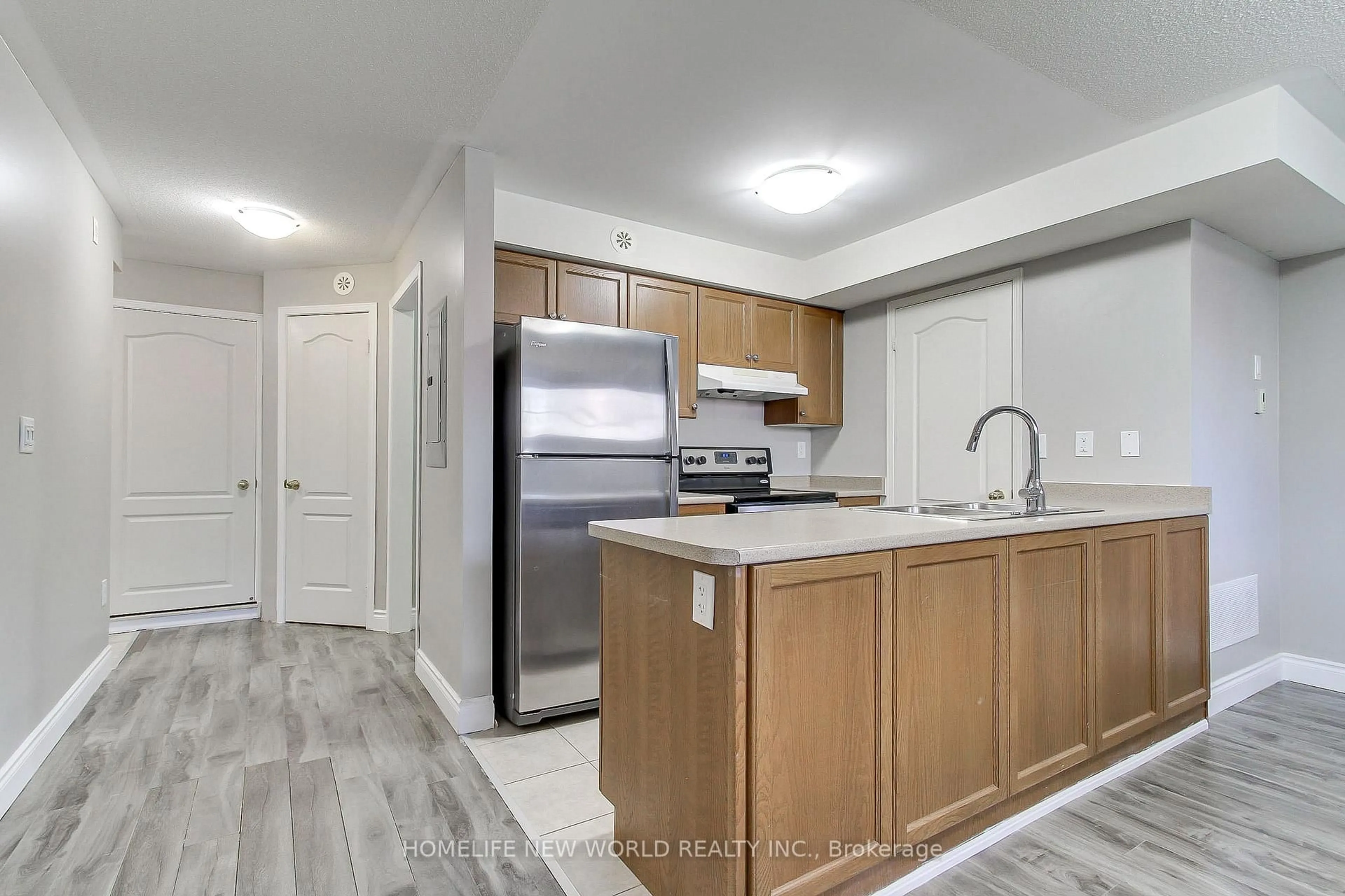 Open concept kitchen, unknown for 133 Isaac Devins Blvd #3, Toronto Ontario M9M 0C4