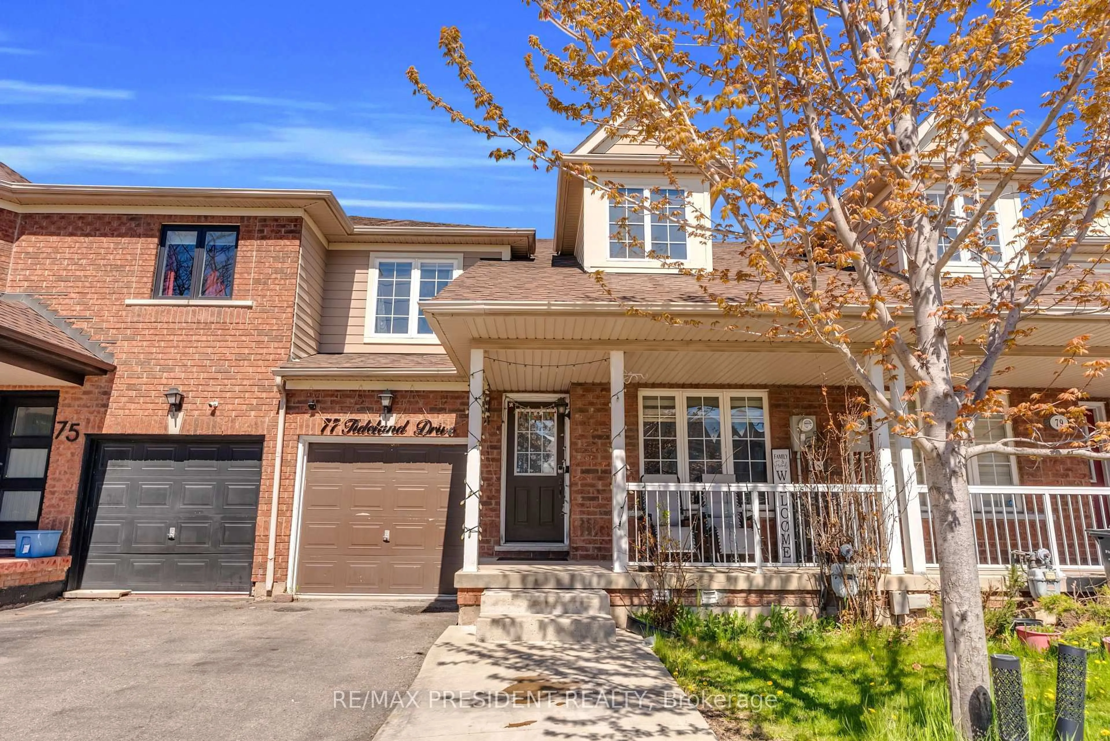 Home with brick exterior material, street for 77 Tideland Dr, Brampton Ontario L7A 2V8