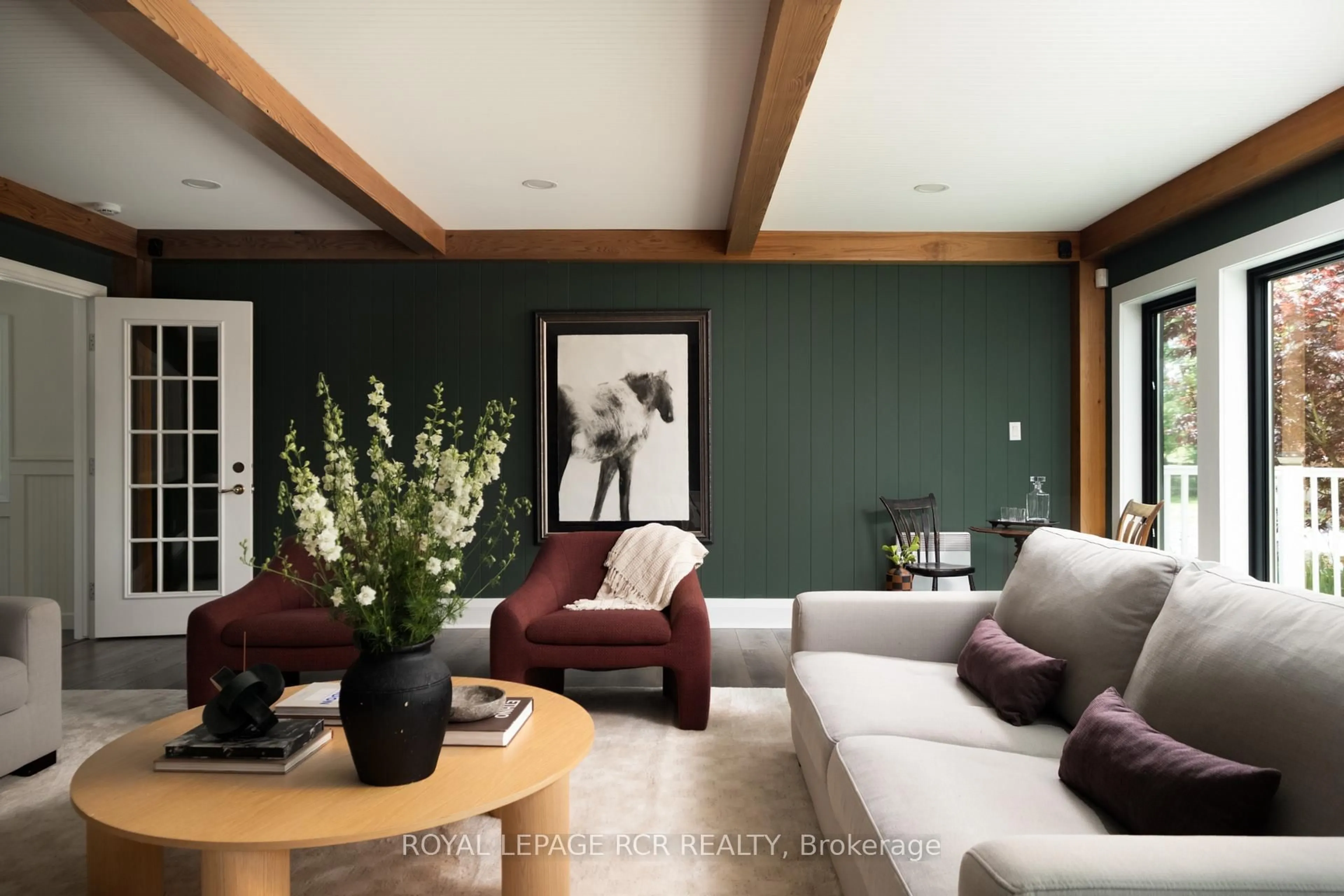 Living room with furniture, wood/laminate floor for 20044 Heart Lake Rd, Caledon Ontario L7K 2A1