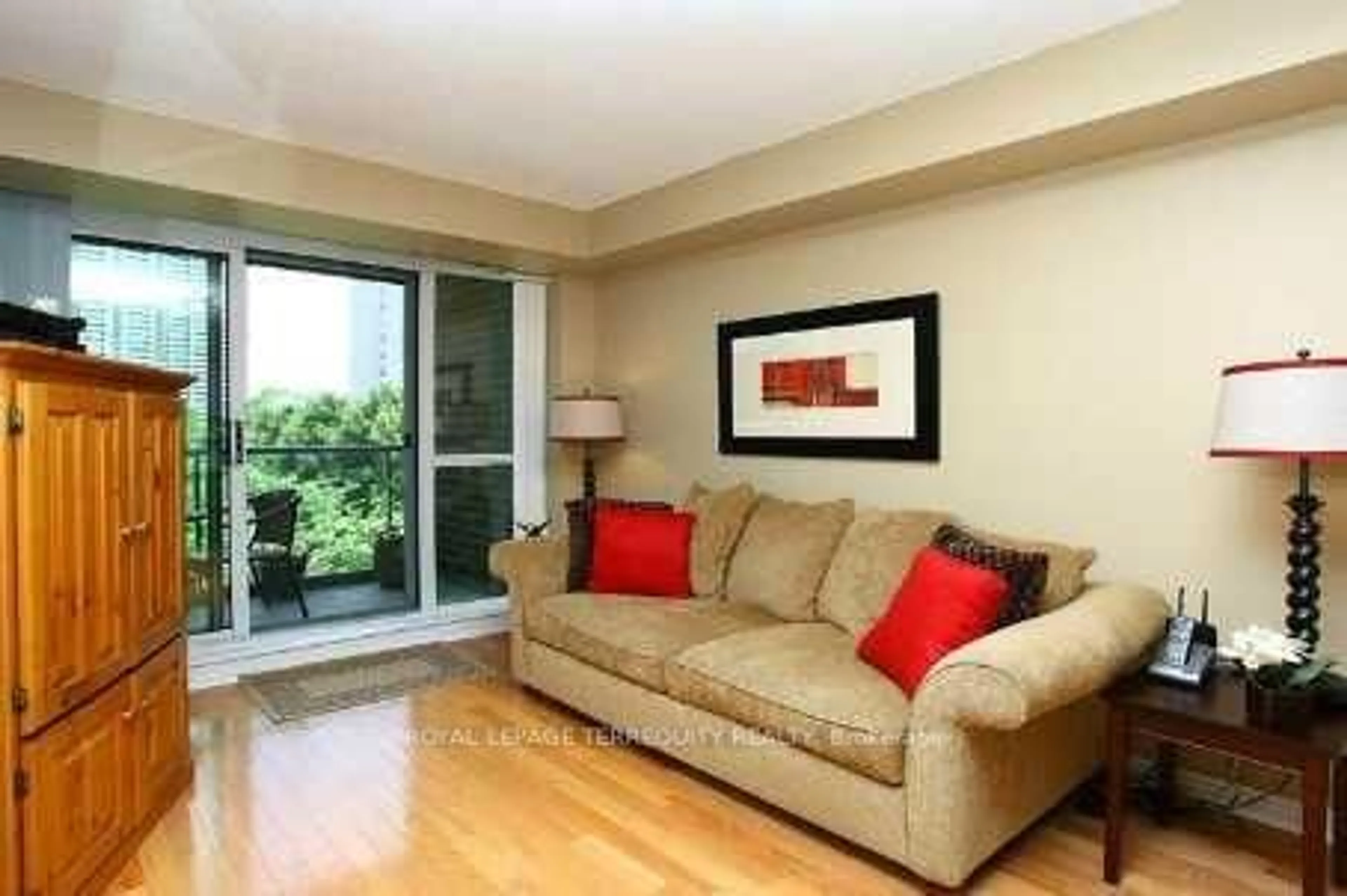 Living room with furniture, wood/laminate floor for 11 Michael Power Pl #301, Toronto Ontario M9A 5G3