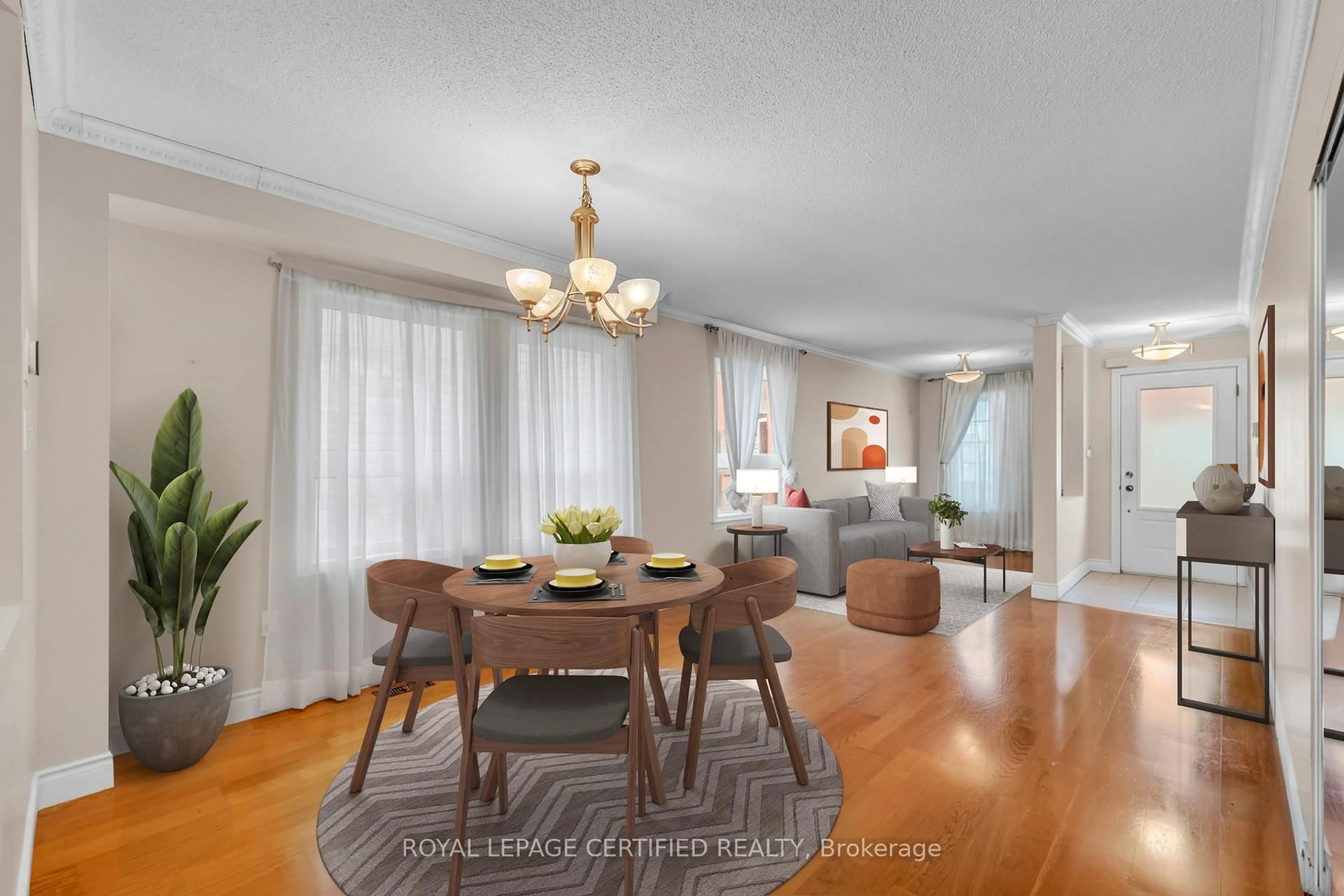Dining room, wood/laminate floor for 17 Chestermere Cres, Brampton Ontario L7A 2E8