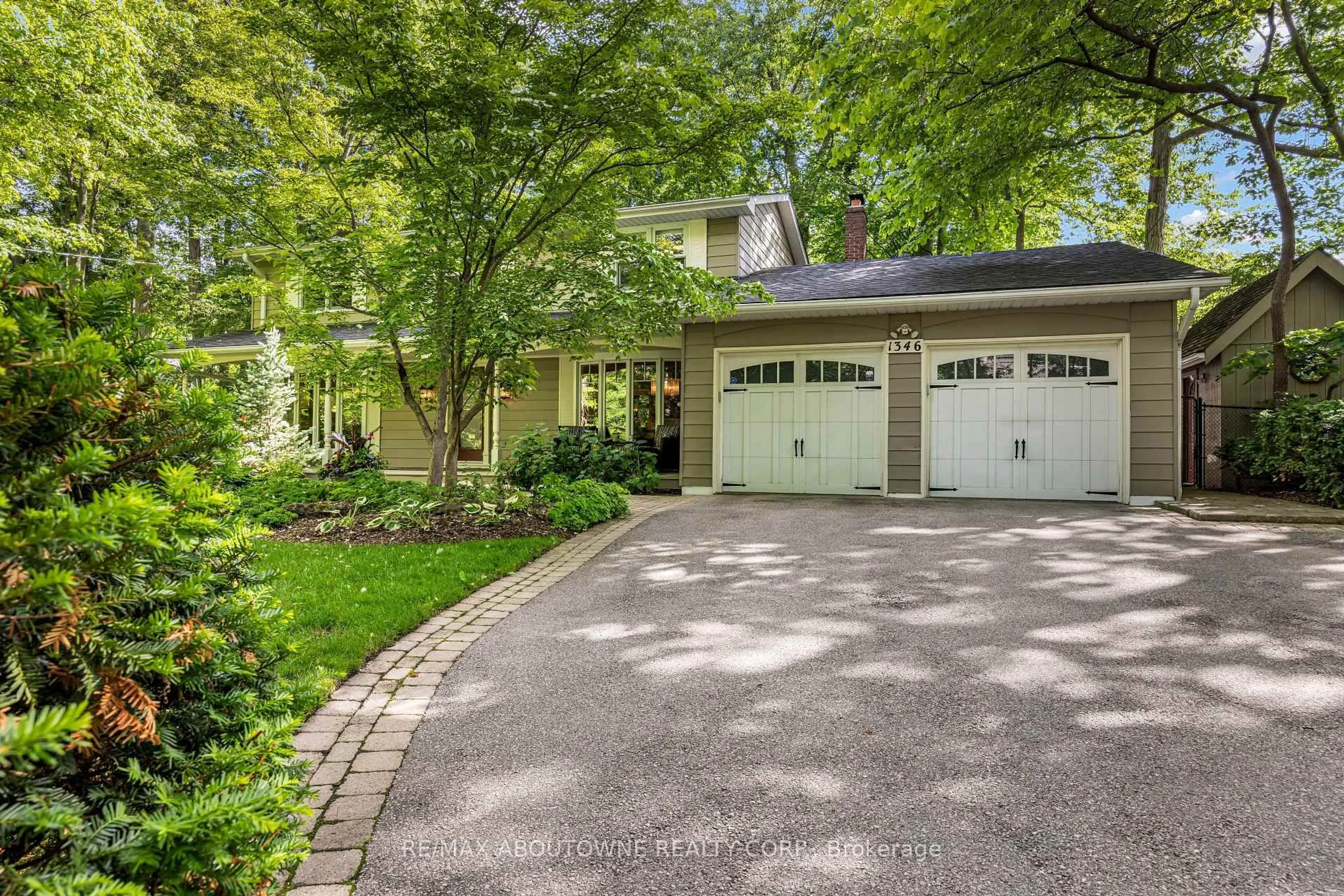 Home with brick exterior material, street for 1346 Whiteoaks Ave, Mississauga Ontario L5J 3C3