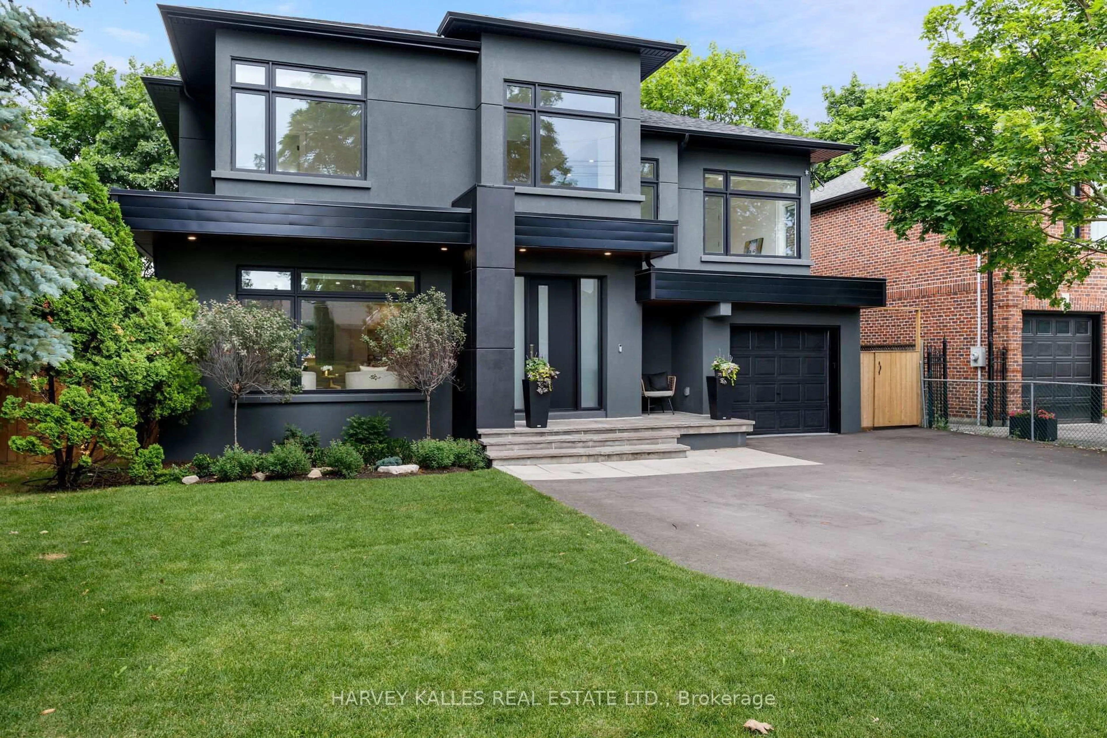 Home with brick exterior material, street for 90 Great Oak Dr, Toronto Ontario M9A 1N5