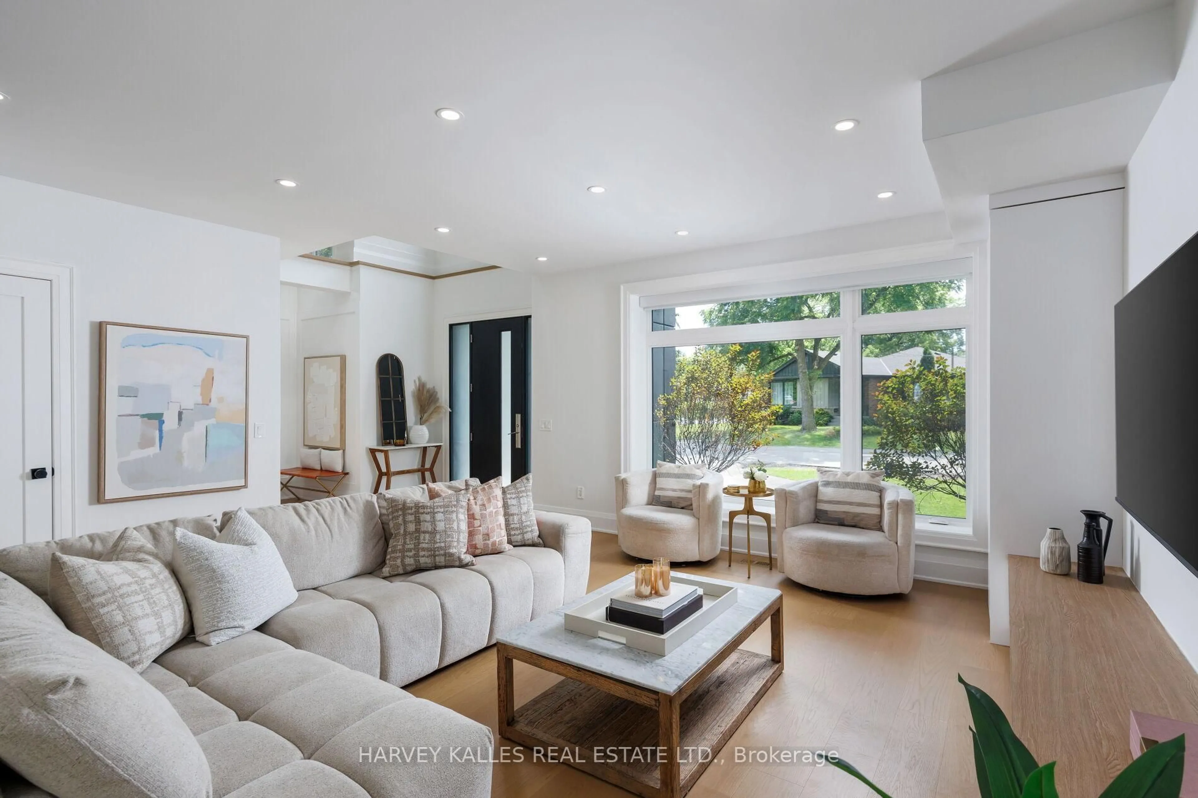 Living room with furniture, unknown for 90 Great Oak Dr, Toronto Ontario M9A 1N5