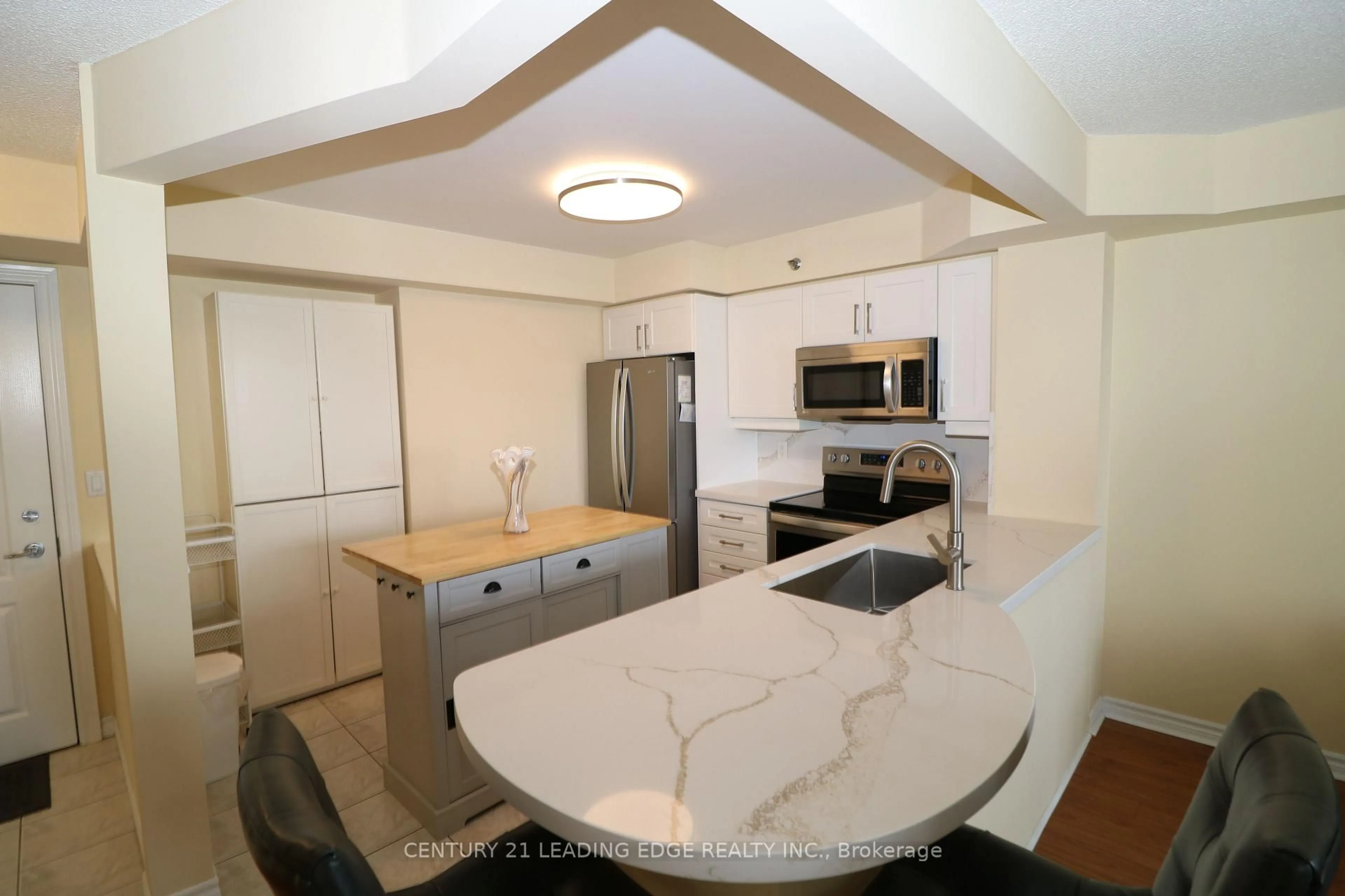 Open concept kitchen, ceramic/tile floor for 4640 Kimbermount Ave #305, Mississauga Ontario L5M 5W6