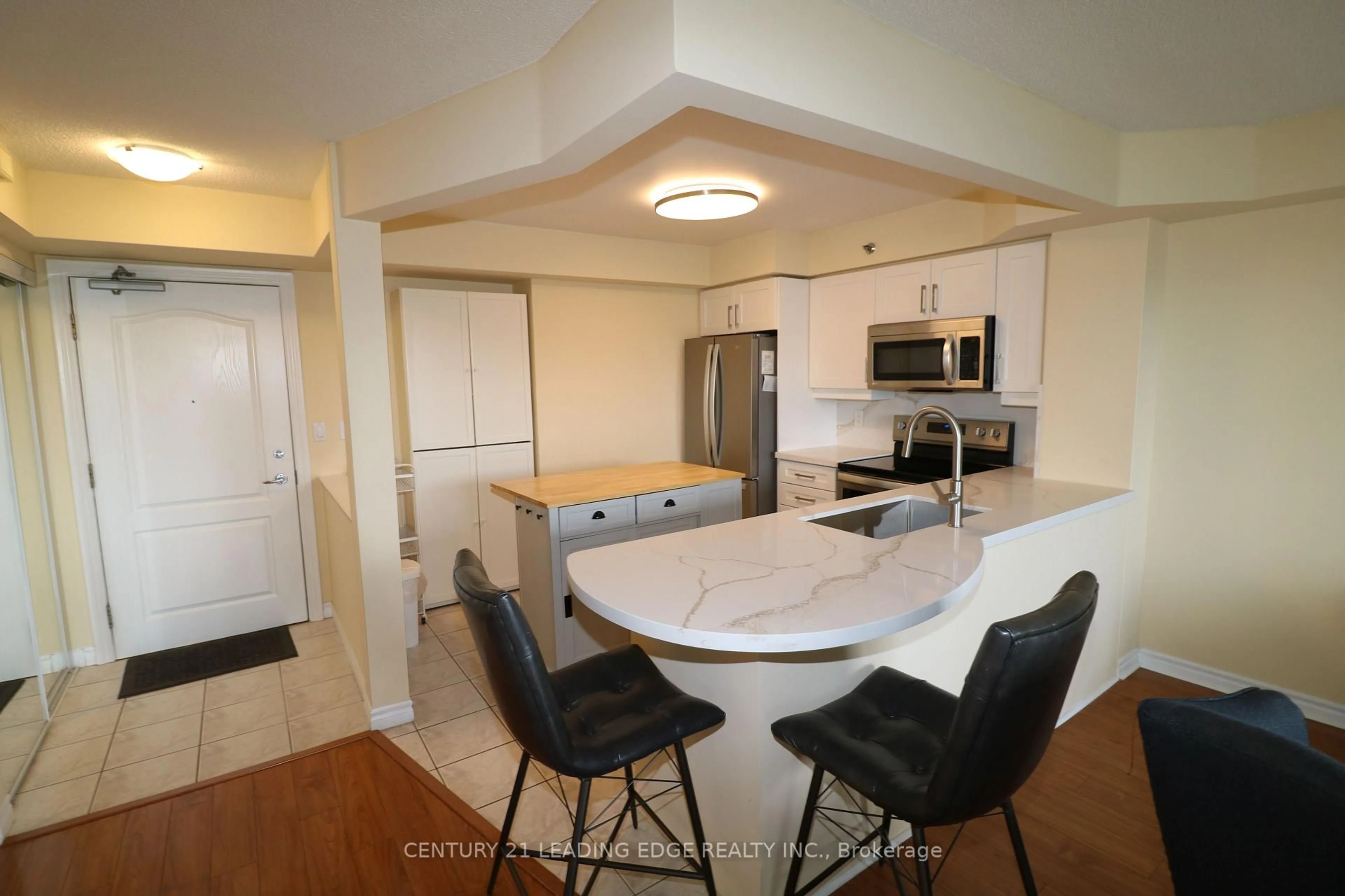 Open concept kitchen, ceramic/tile floor for 4640 Kimbermount Ave #305, Mississauga Ontario L5M 5W6