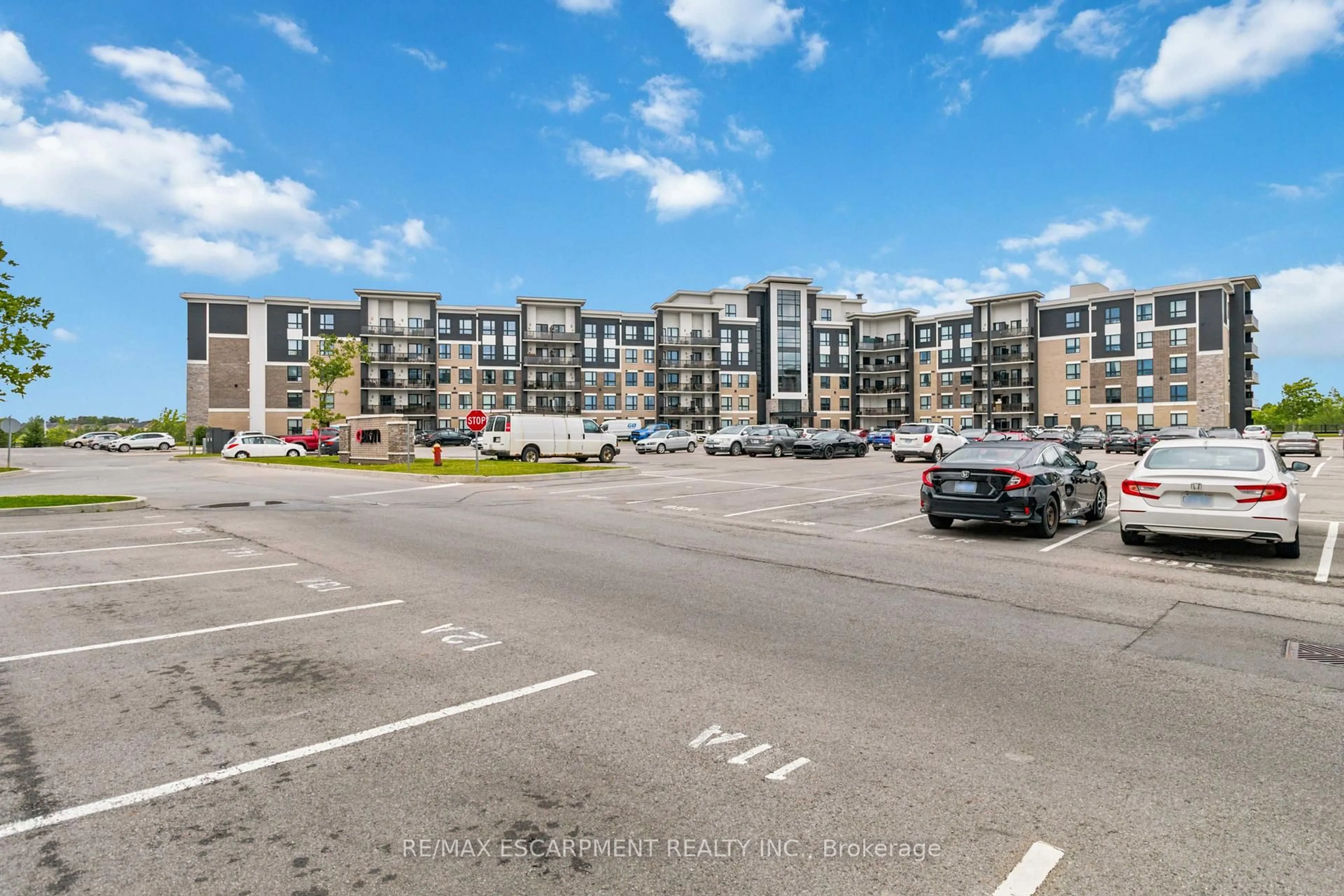 A pic from outside/outdoor area/front of a property/back of a property/a pic from drone, street for 630 Sauve St #113, Milton Ontario L9T 9A6