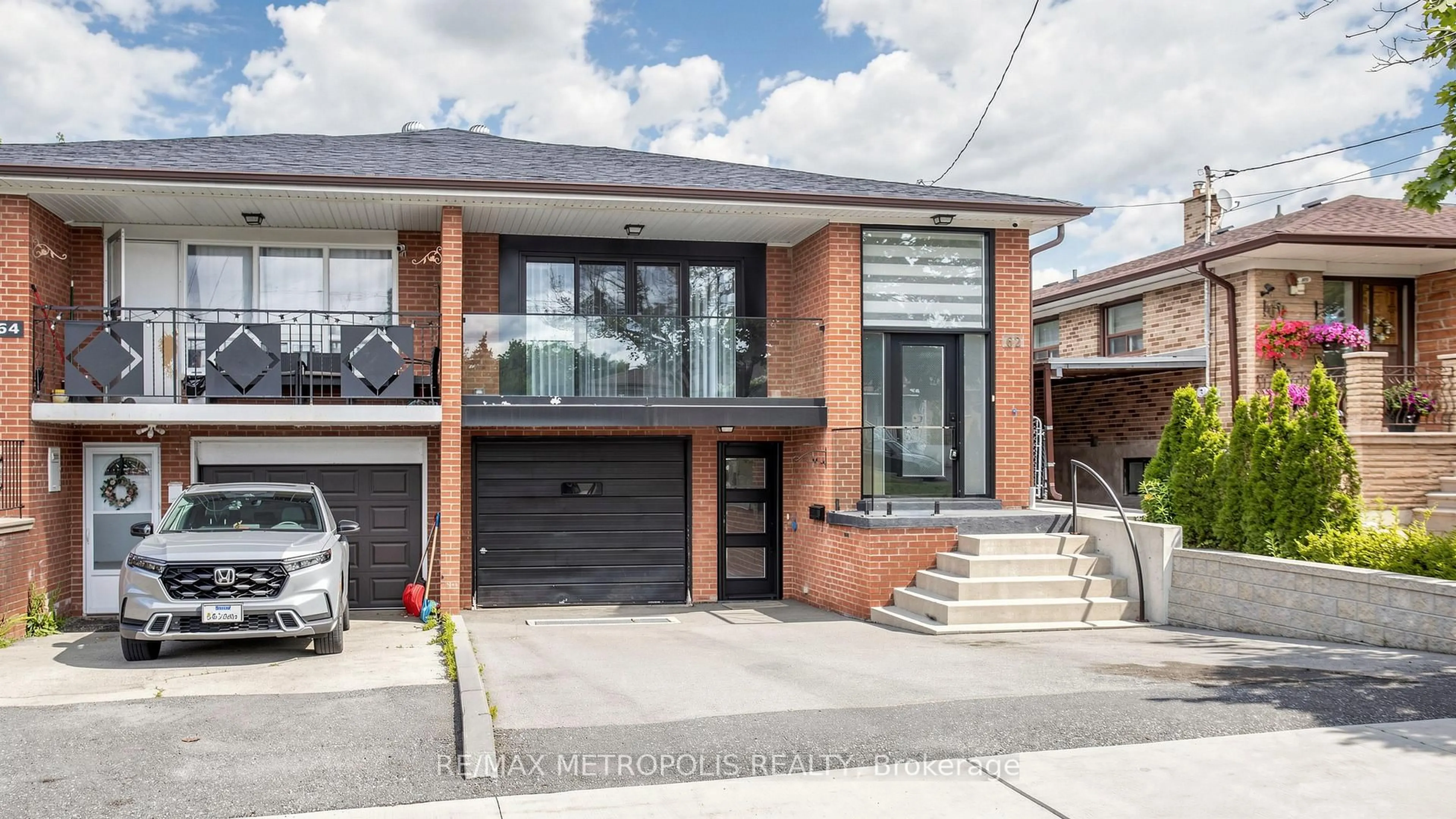 Home with brick exterior material, street for 62 Davelayne Rd, Toronto Ontario M9M 2A7