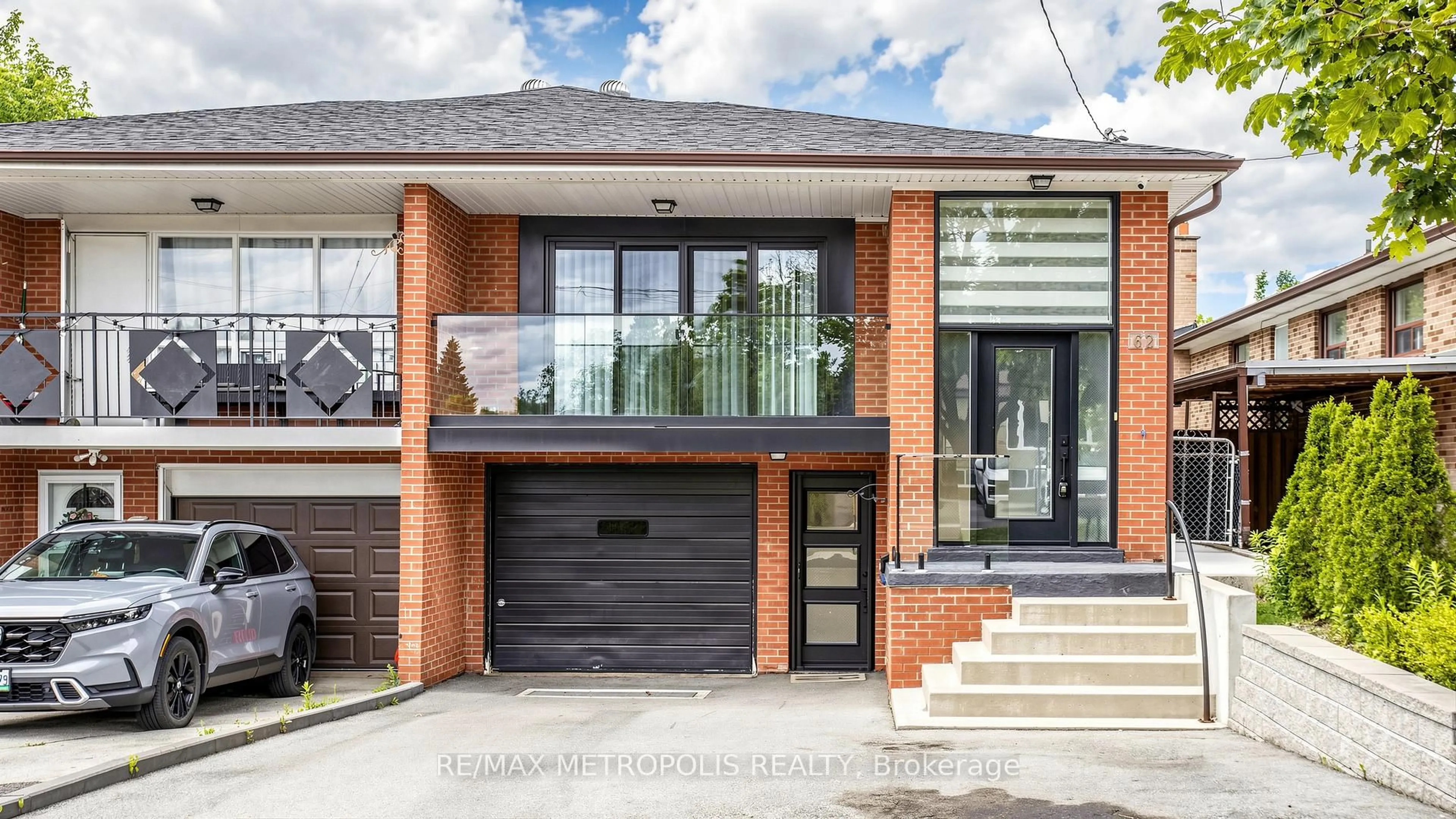 Home with brick exterior material, street for 62 Davelayne Rd, Toronto Ontario M9M 2A7
