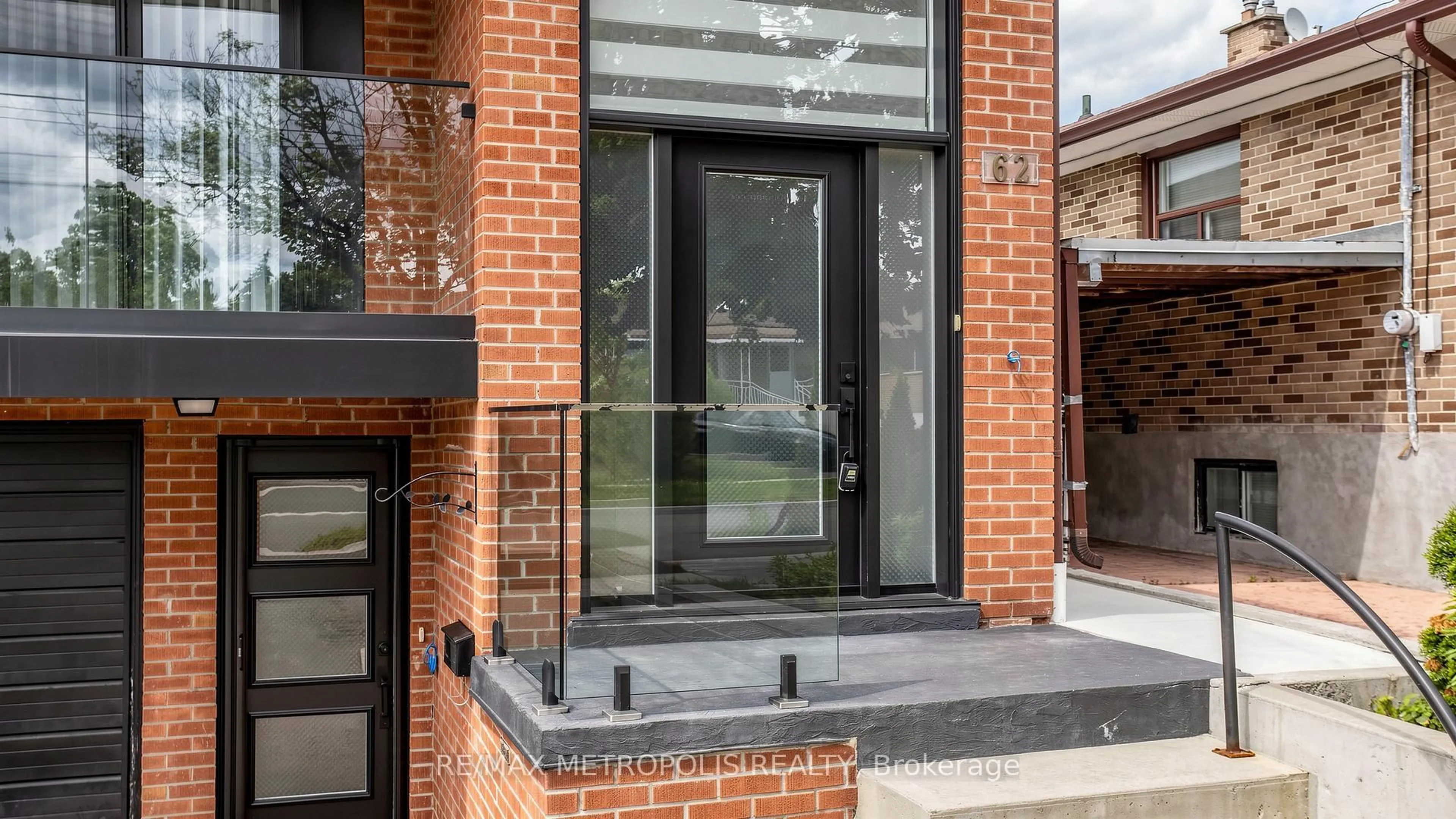 Home with brick exterior material, street for 62 Davelayne Rd, Toronto Ontario M9M 2A7
