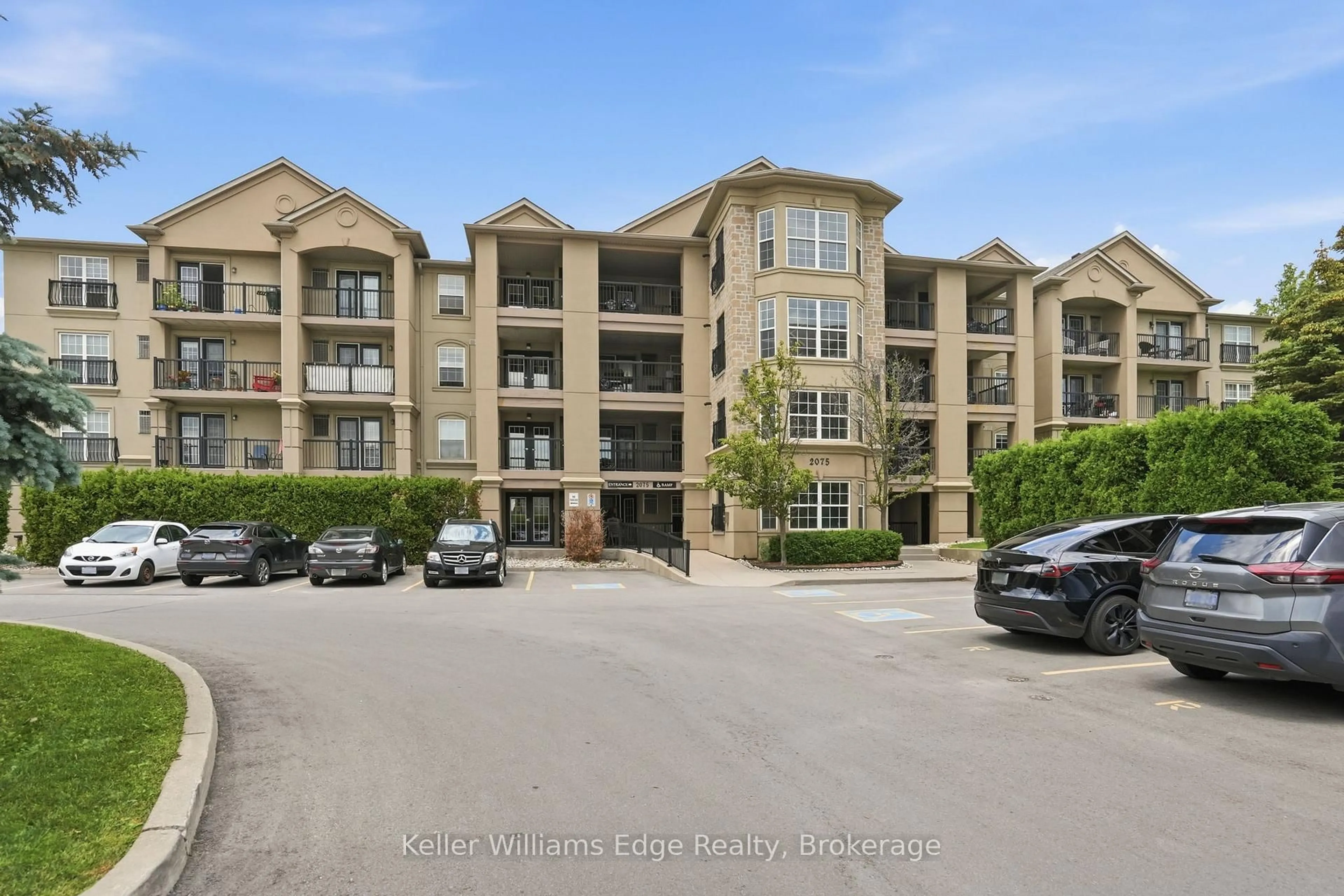 A pic from outside/outdoor area/front of a property/back of a property/a pic from drone, water/lake/river/ocean view for 2075 Appleby Line #406, Burlington Ontario L7L 7H3