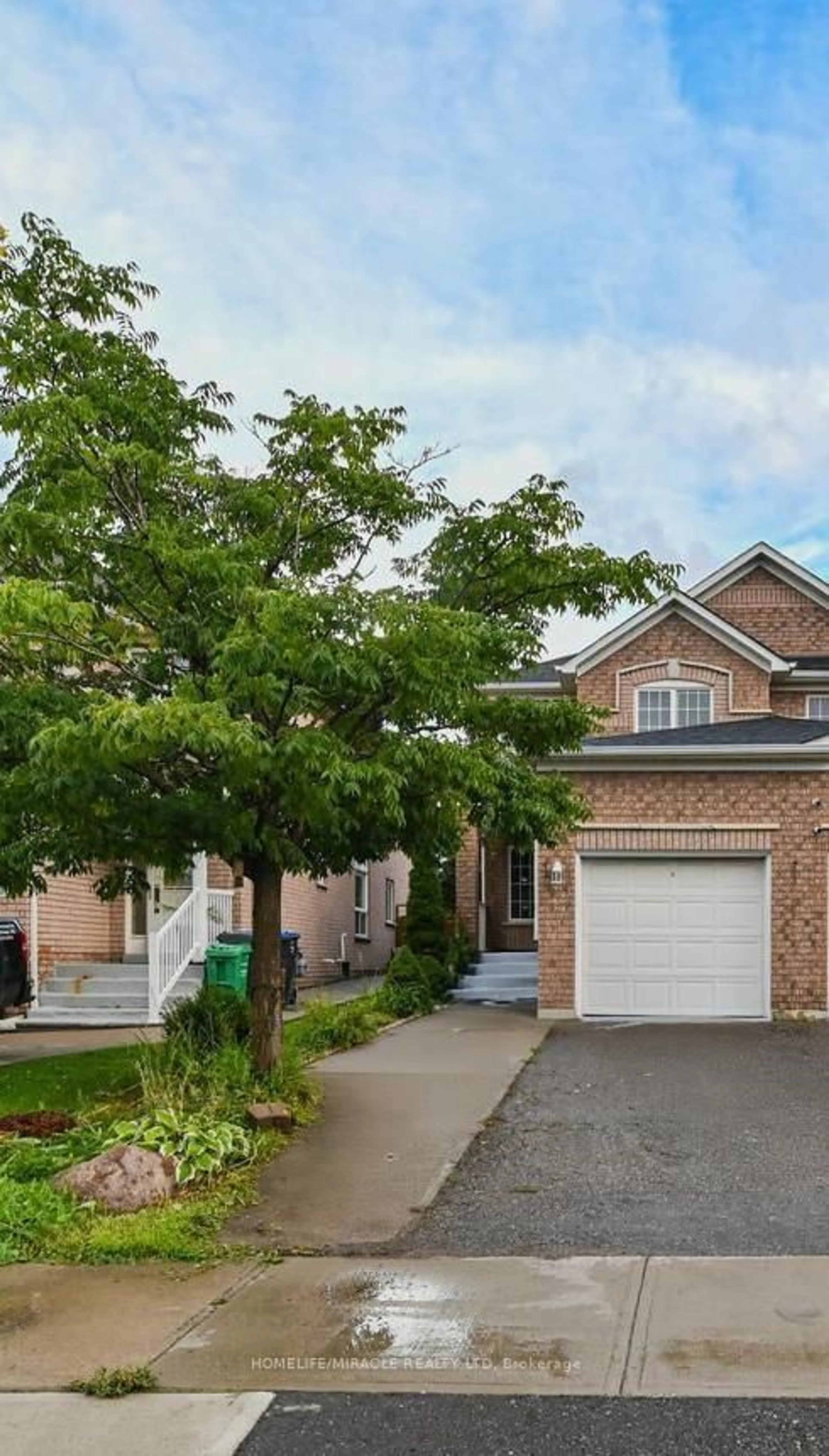 Home with brick exterior material, street for 46 Weather Vane Lane, Brampton Ontario L6X 4R5