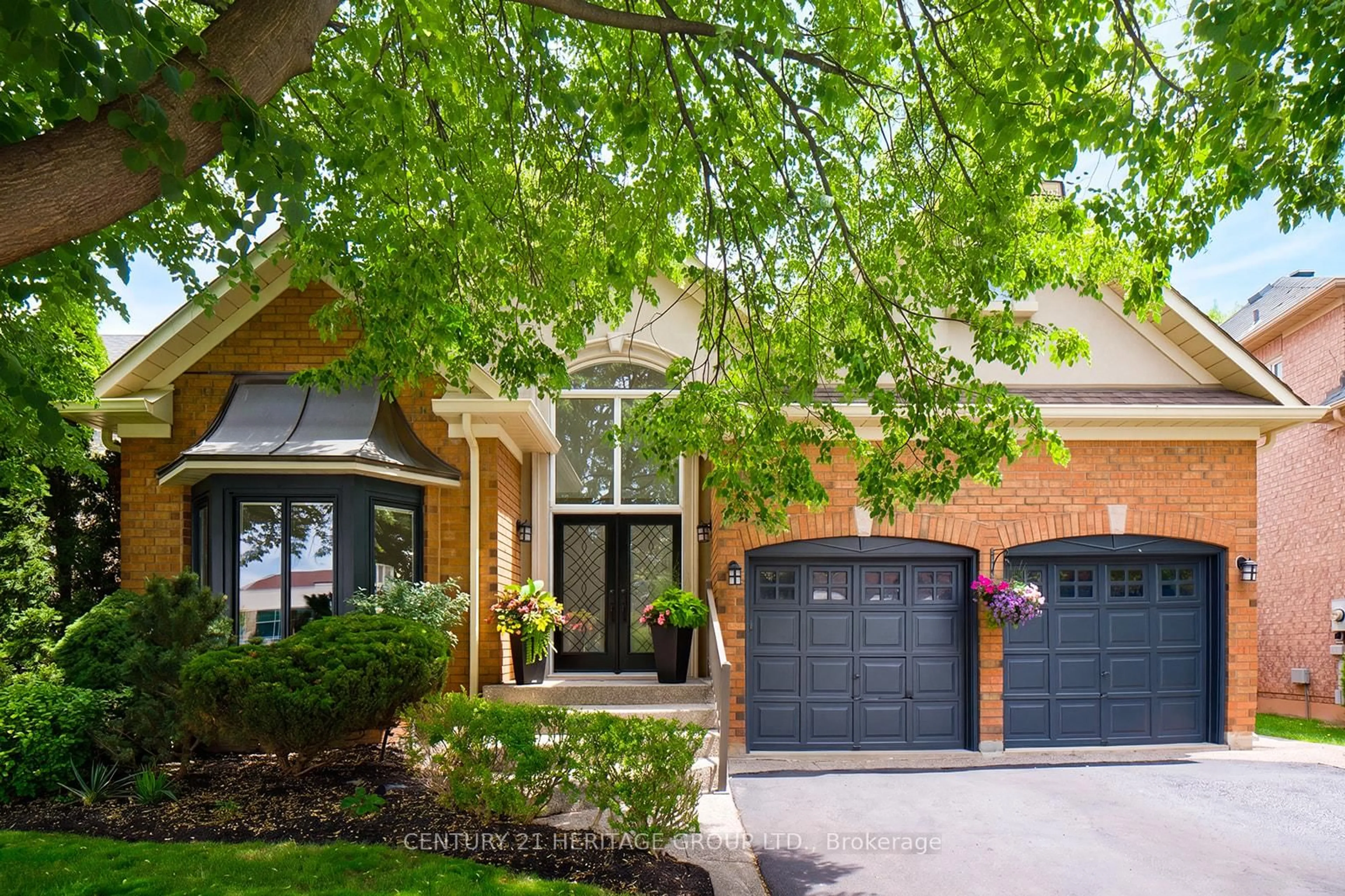 Home with brick exterior material, street for 1018 Riverbank Way, Oakville Ontario L6H 6X1