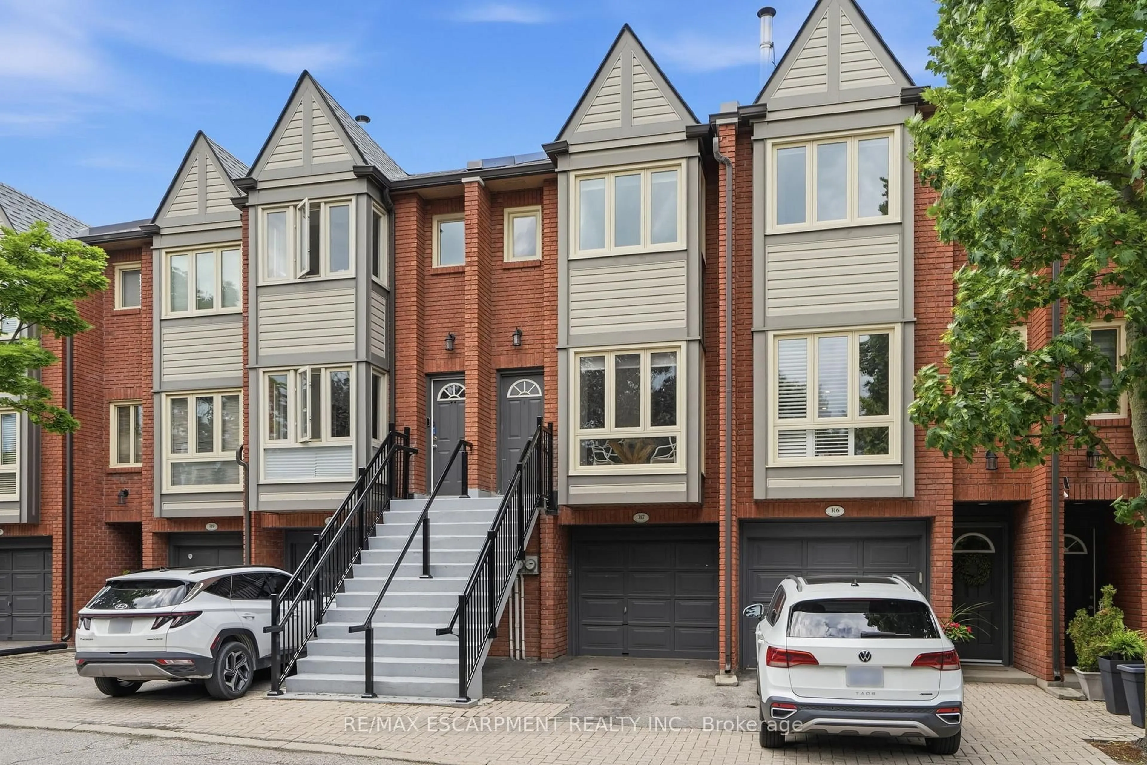 Home with brick exterior material, street for 895 Maple Ave #317, Burlington Ontario L7S 2H7