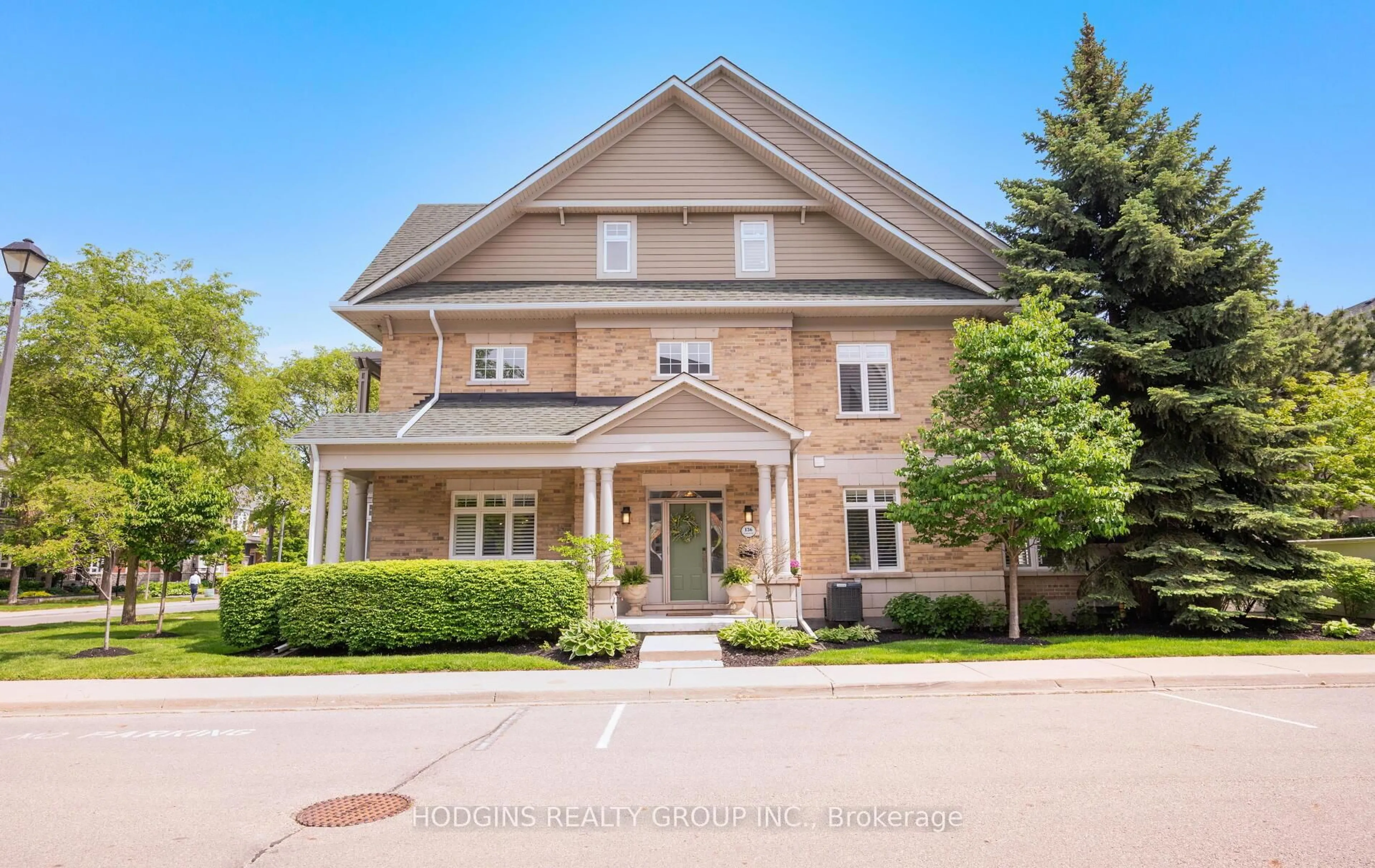 Home with brick exterior material, street for 136 St Lawrence Dr #42, Mississauga Ontario L5G 4V1