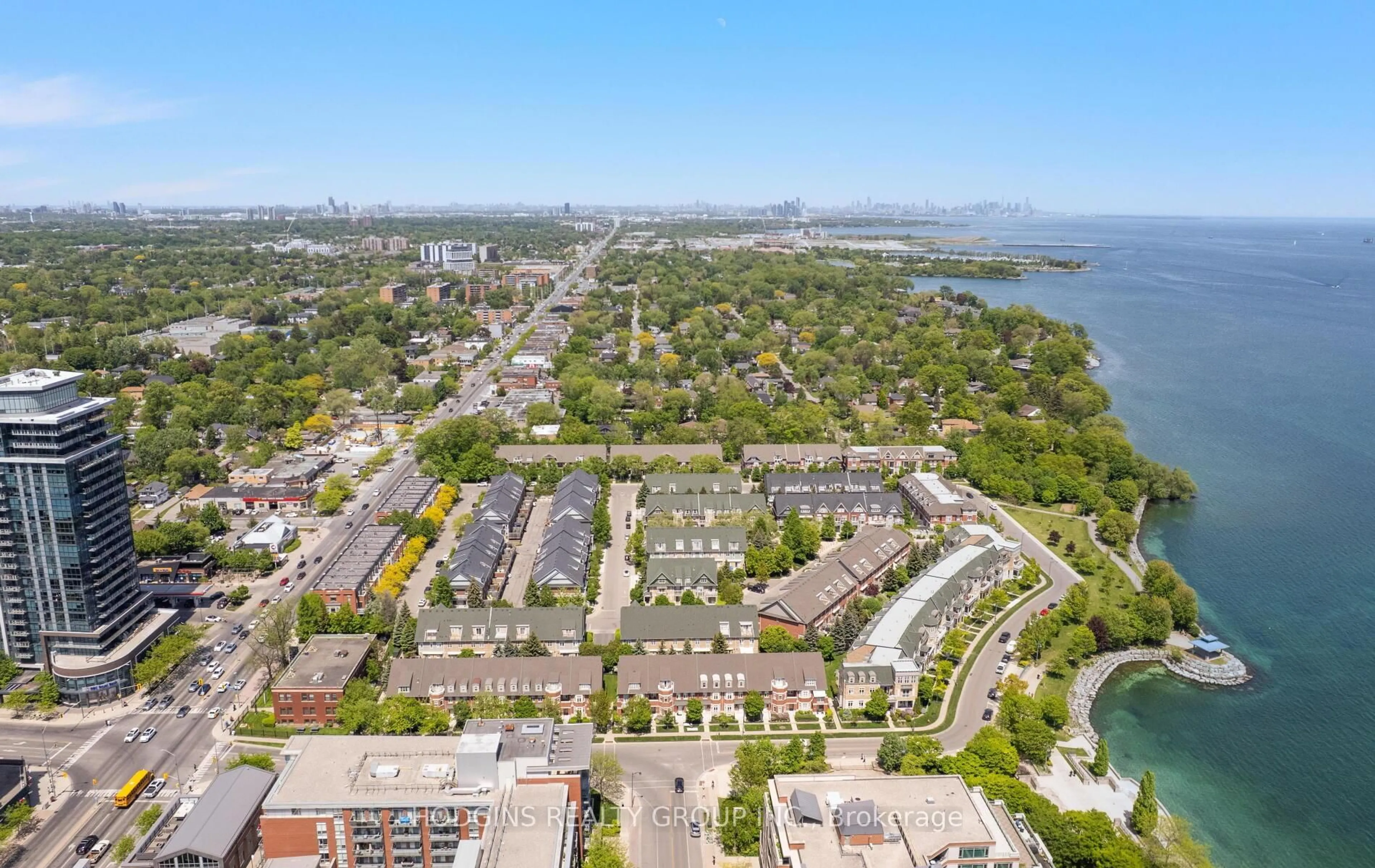 A pic from outside/outdoor area/front of a property/back of a property/a pic from drone, water/lake/river/ocean view for 136 St Lawrence Dr #42, Mississauga Ontario L5G 4V1