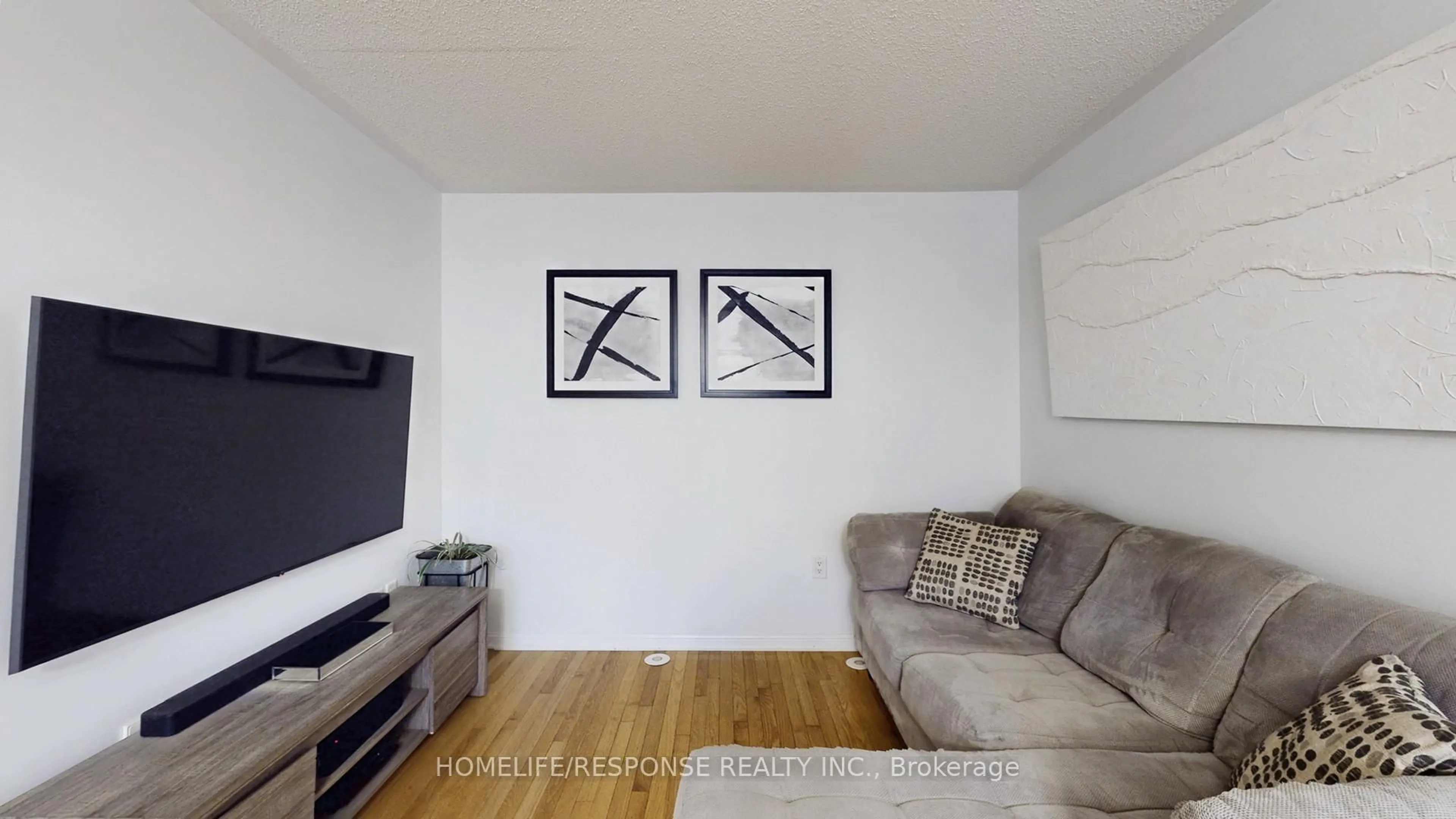 Living room with furniture, wood/laminate floor for 931 Deverell Pl, Milton Ontario L9T 0M3