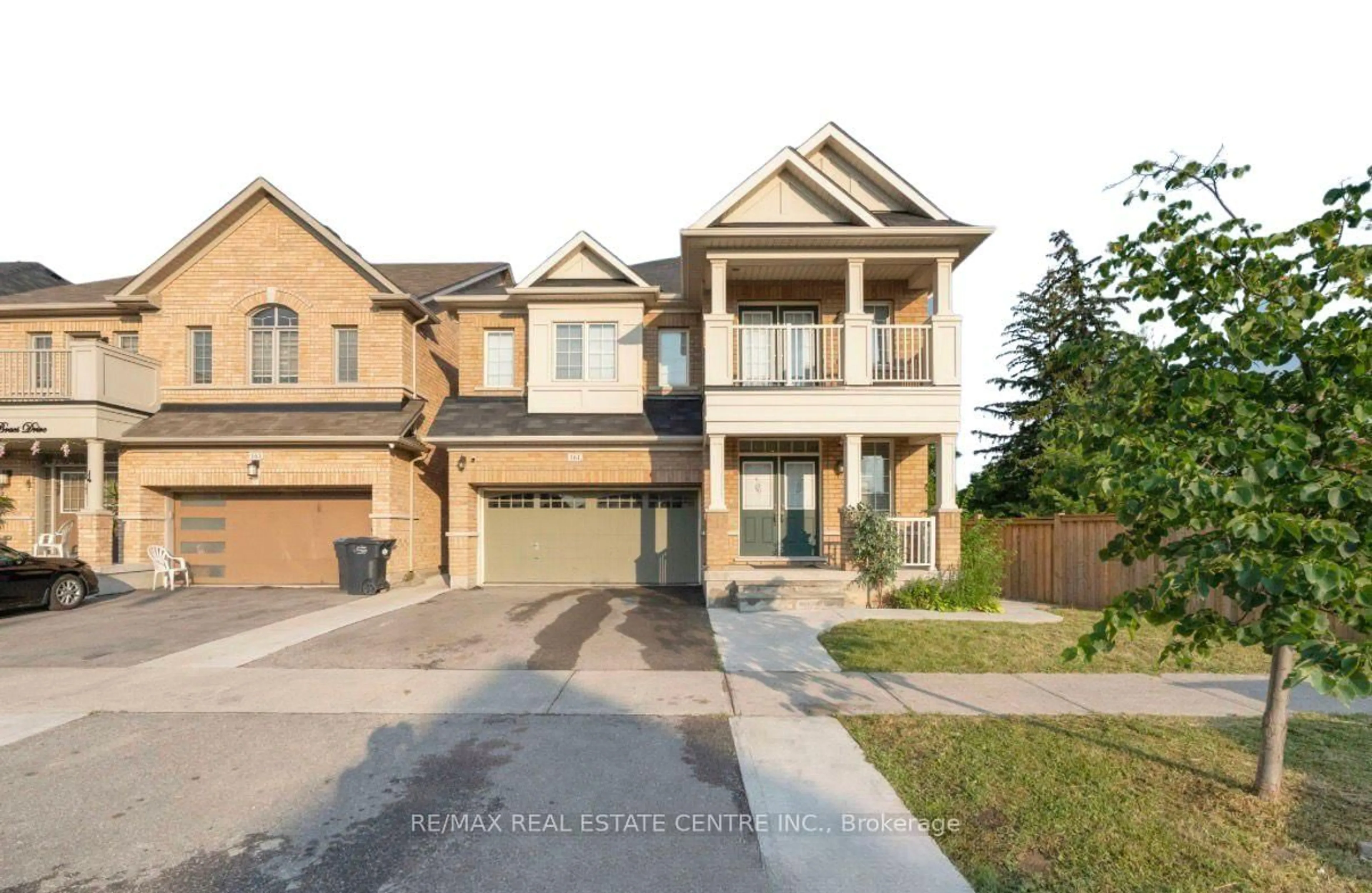 Home with brick exterior material, street for 161 Bonnie Braes Dr, Brampton Ontario L6Y 5Z1