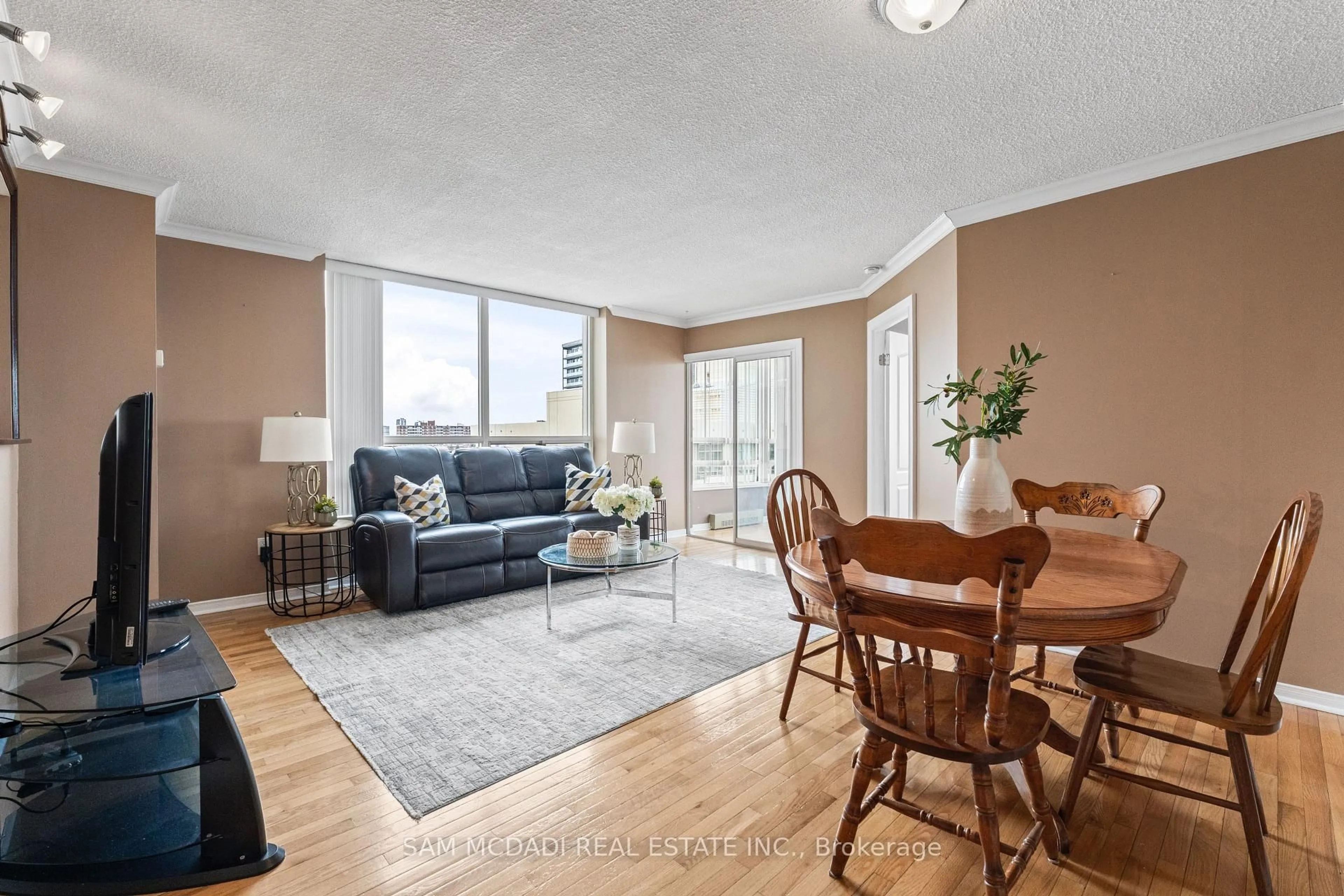Living room with furniture, wood/laminate floor for 75 King St #1105, Mississauga Ontario L5A 4G5