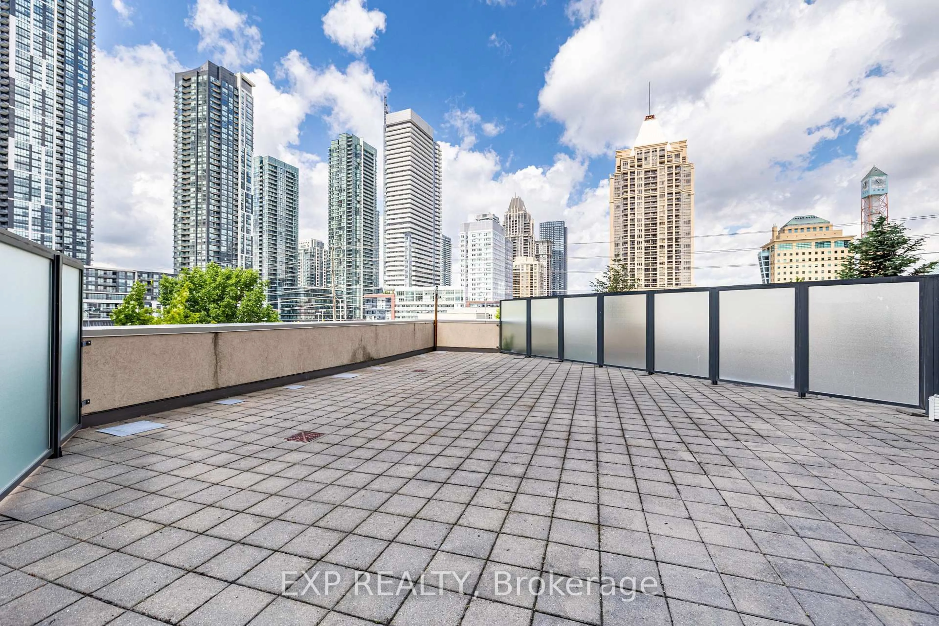 Patio, city buildings view from balcony for 330 Burnhamthorpe Rd #303, Mississauga Ontario L5B 0E1