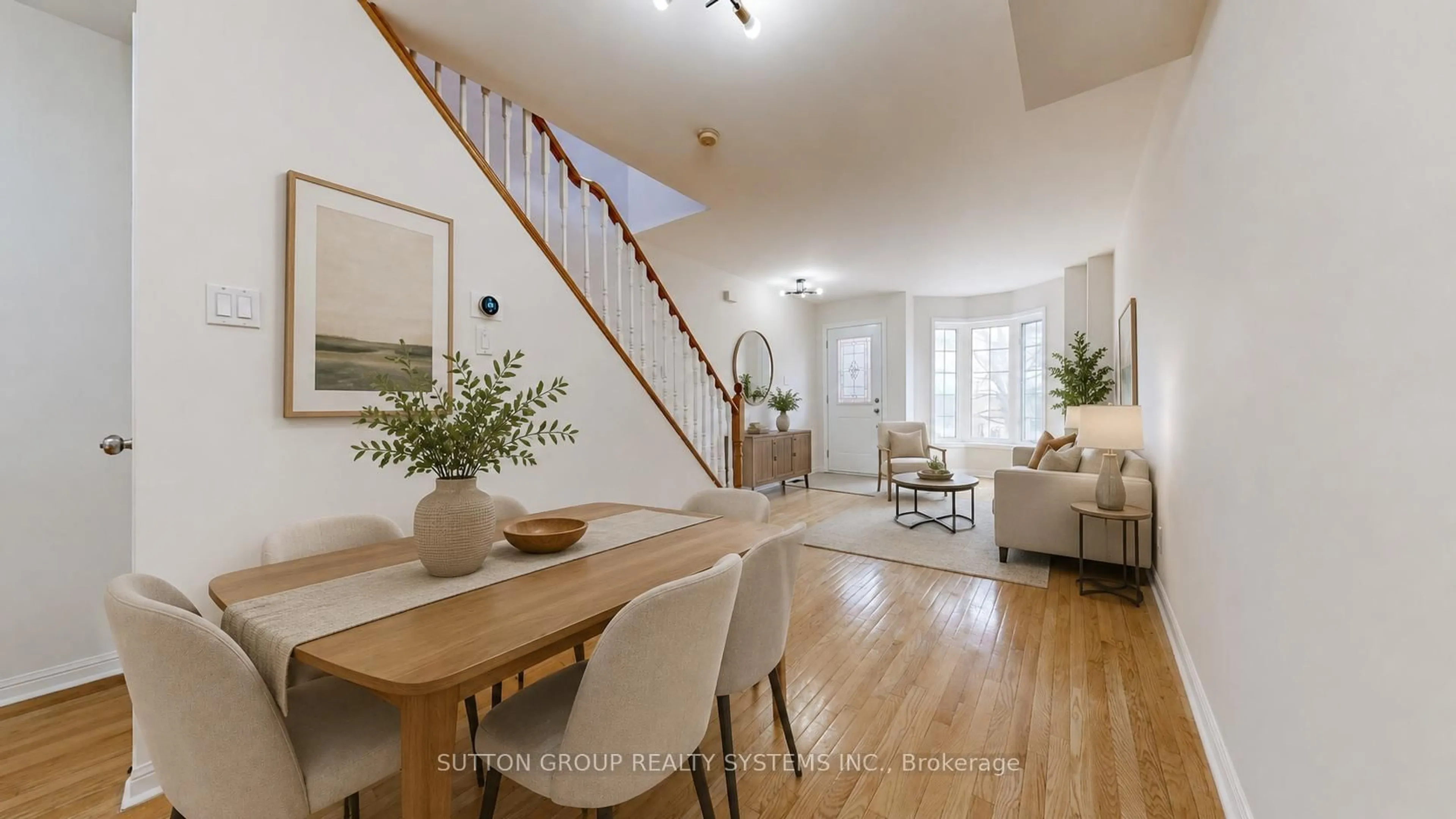 Living room with furniture, wood/laminate floor for 68 Osler St, Toronto Ontario M6P 4A2
