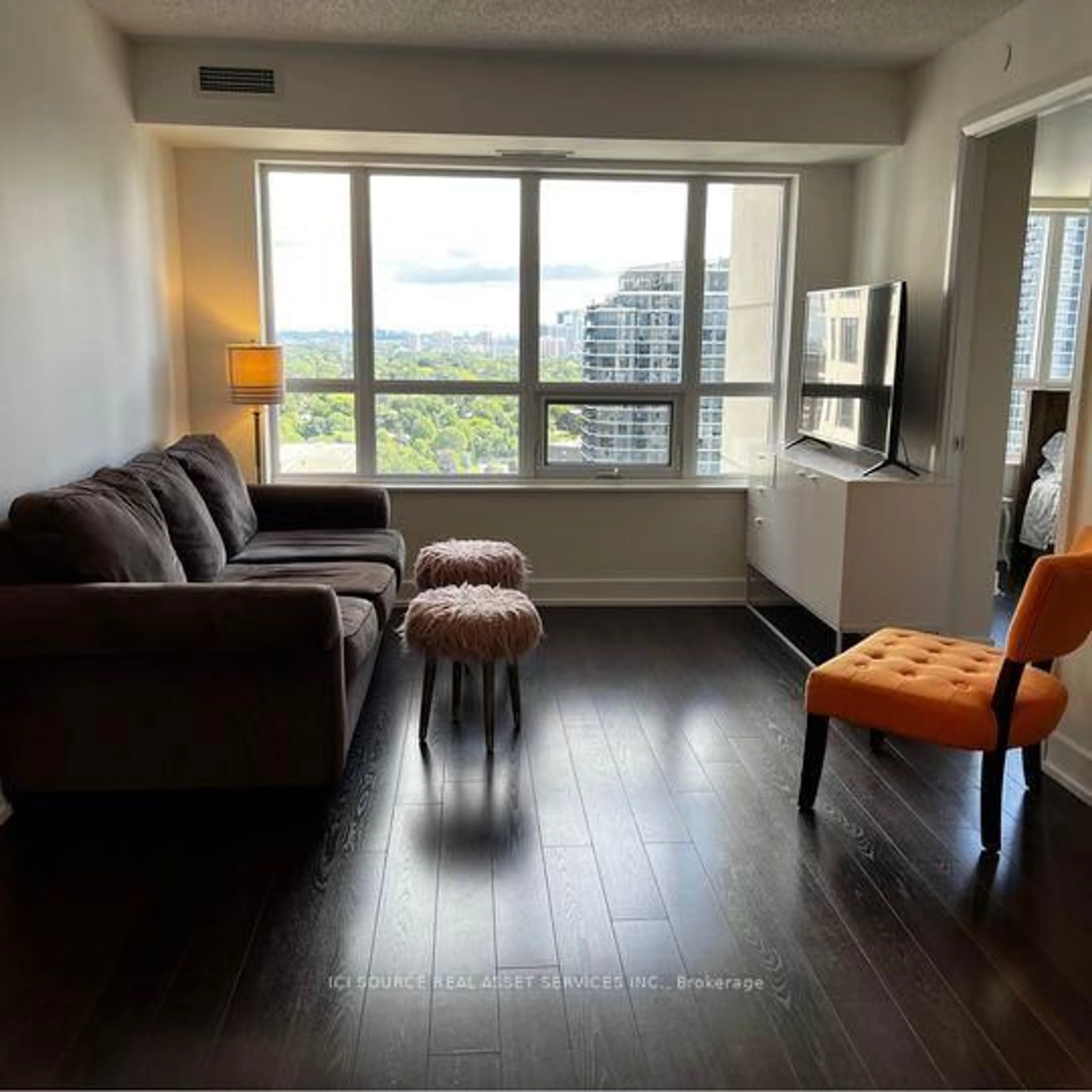 Living room with furniture, wood/laminate floor for 6 Eva Rd #1803, Toronto Ontario M9C 0B1