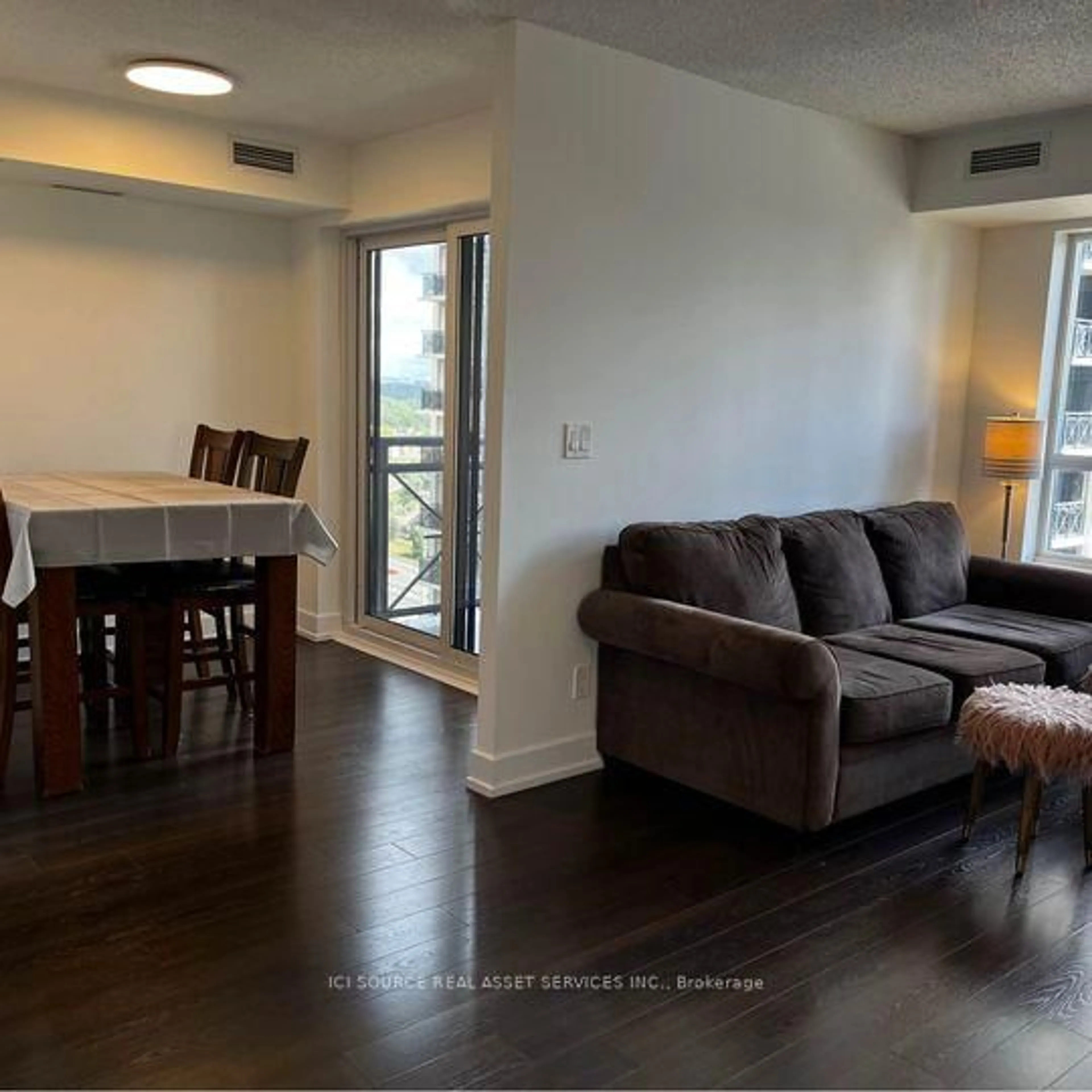 Living room with furniture, wood/laminate floor for 6 Eva Rd #1803, Toronto Ontario M9C 0B1