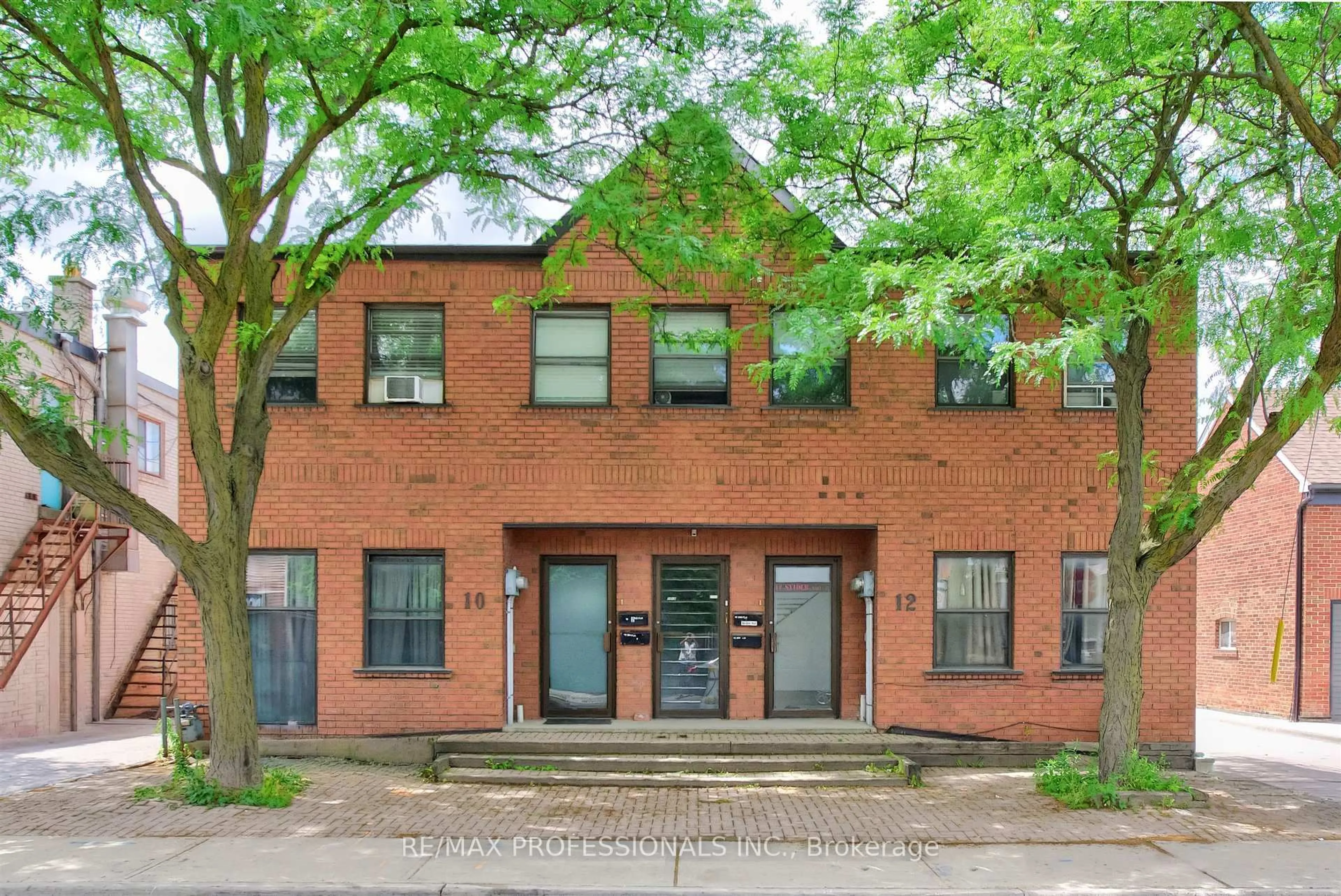 Home with brick exterior material, building for 10-12 Snider Ave, Toronto Ontario M6E 4R9
