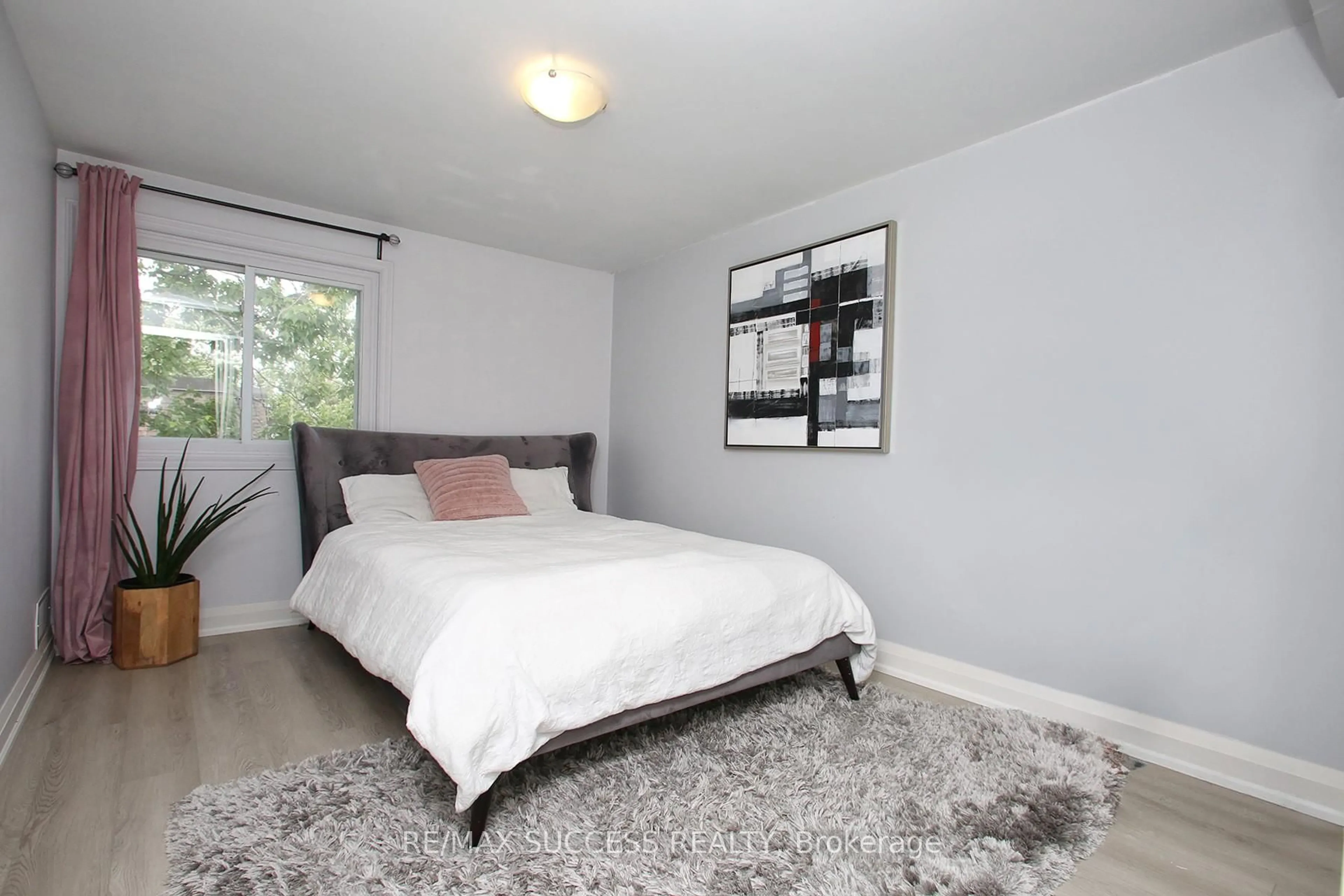 Bedroom with bed, carpet floor for 591 Timber Lane #591, Burlington Ontario L7L 4B1