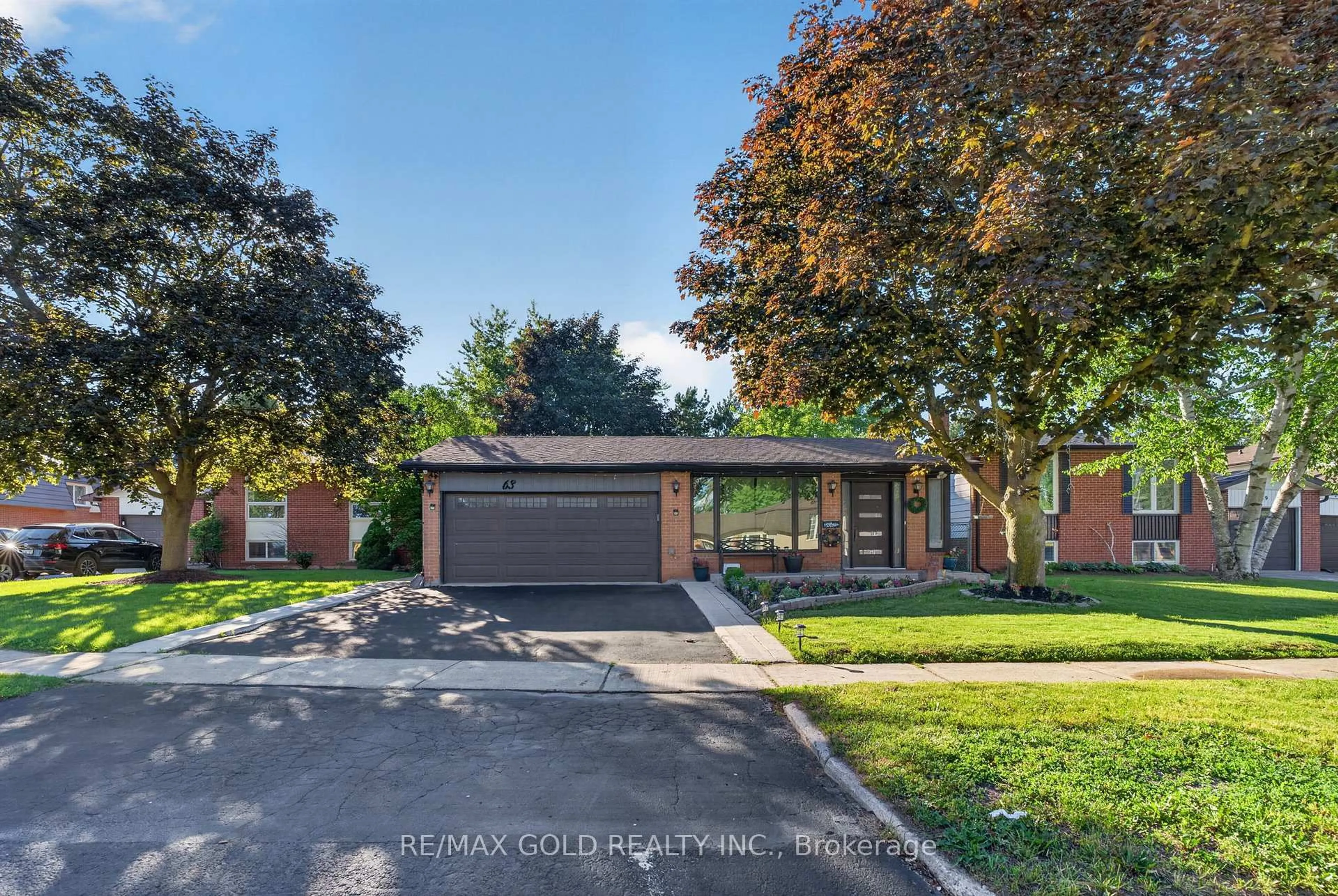 Home with brick exterior material, street for 63 Morgandale Cres, Orangeville Ontario L9W 3C6