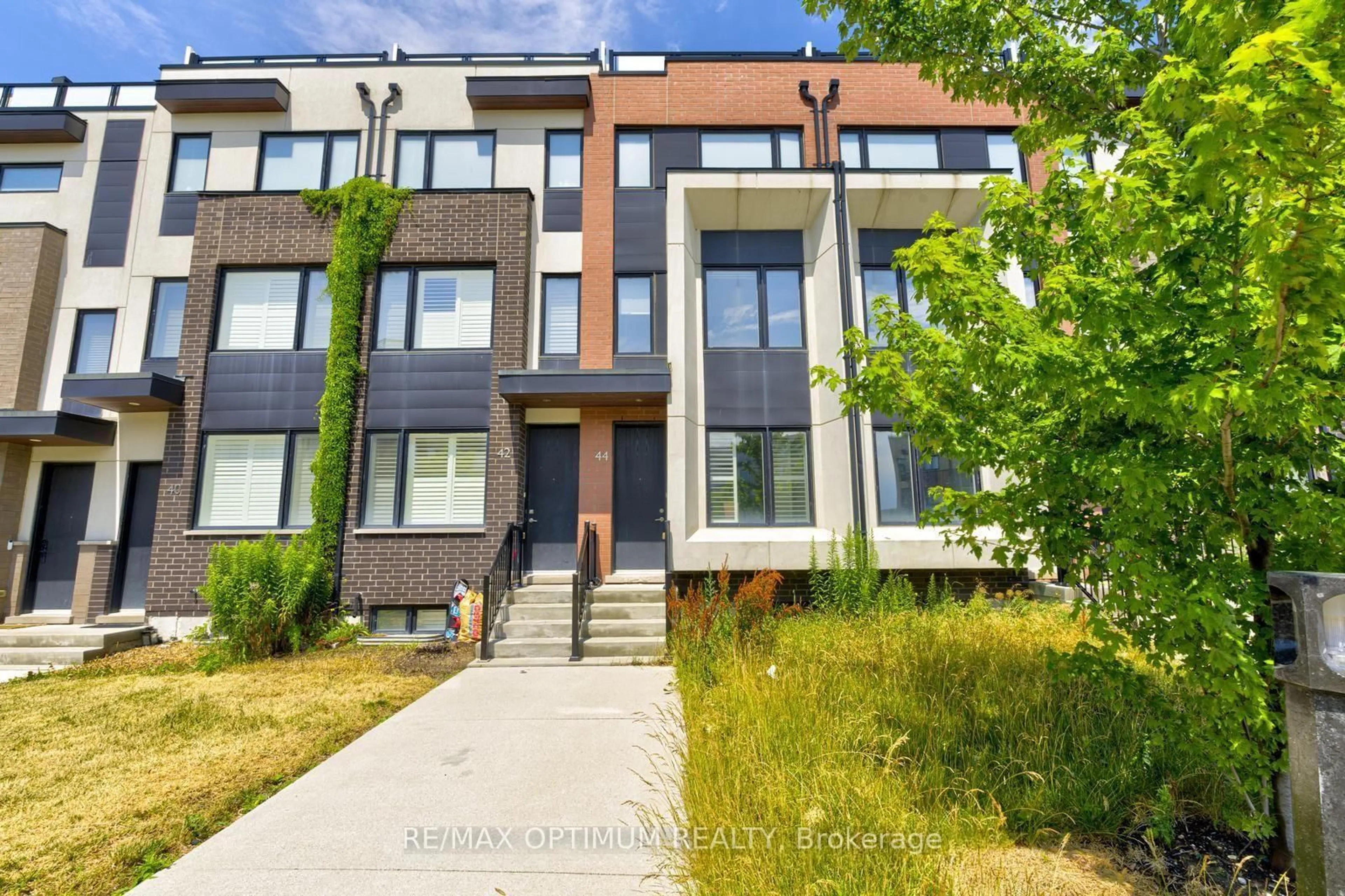 Home with brick exterior material, street for 44 Sarah Jackson Cres, Toronto Ontario M3K 0B6