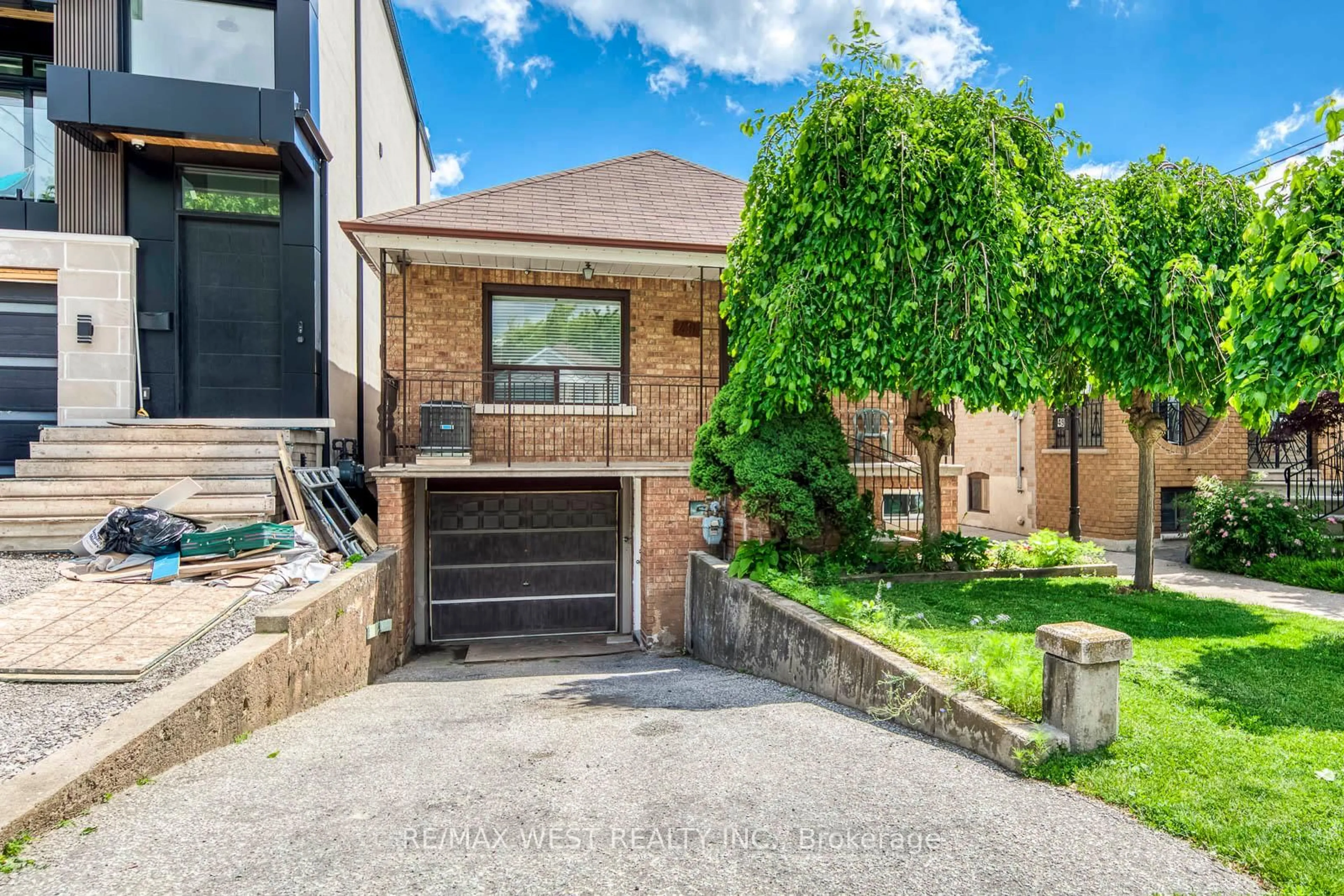 Home with brick exterior material, street for 49 Montcalm Ave, Toronto Ontario M6E 4N8