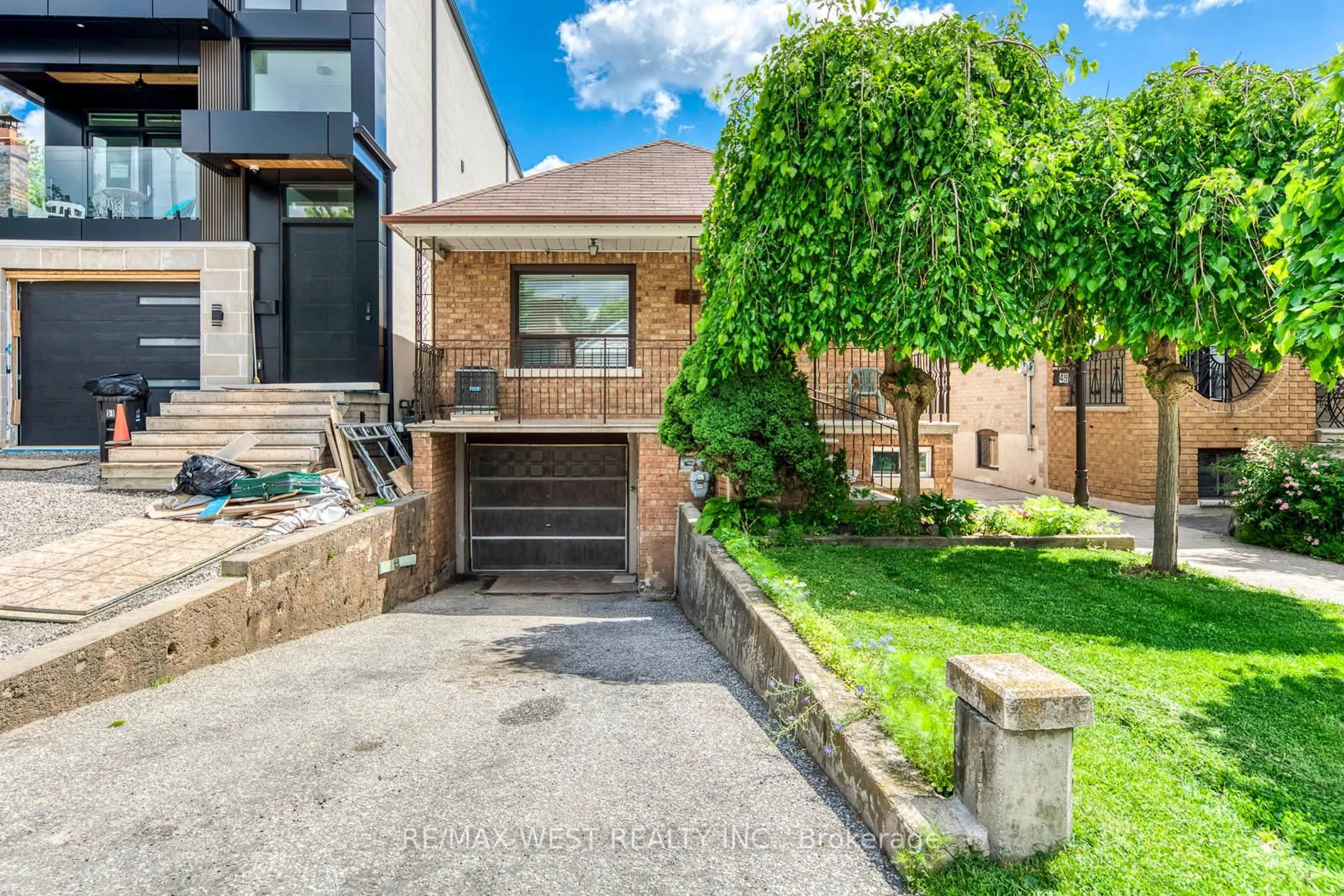 Home with brick exterior material, street for 49 Montcalm Ave, Toronto Ontario M6E 4N8