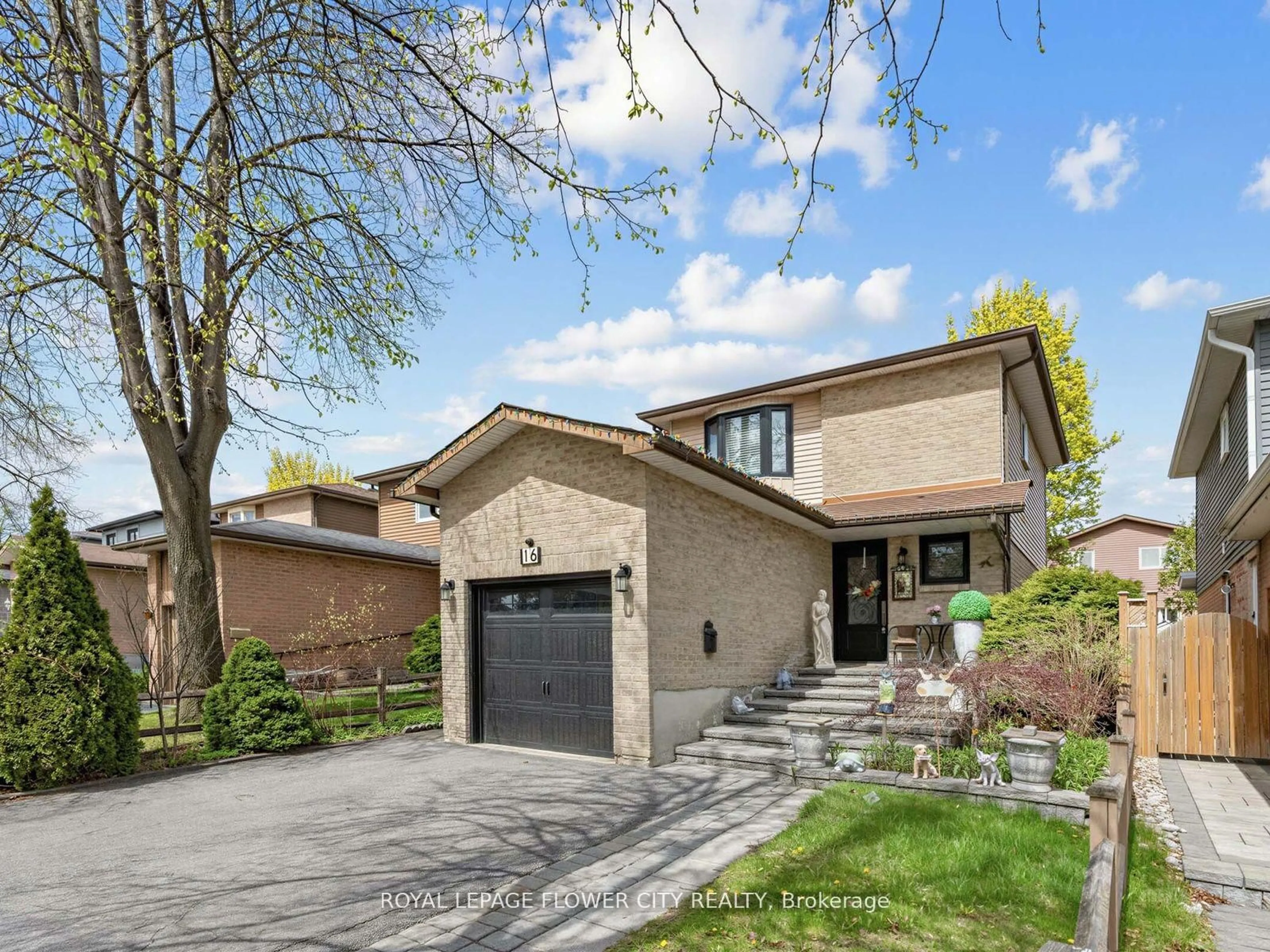 Home with brick exterior material, street for 16 Blossom Ave, Brampton Ontario L6X 2W3